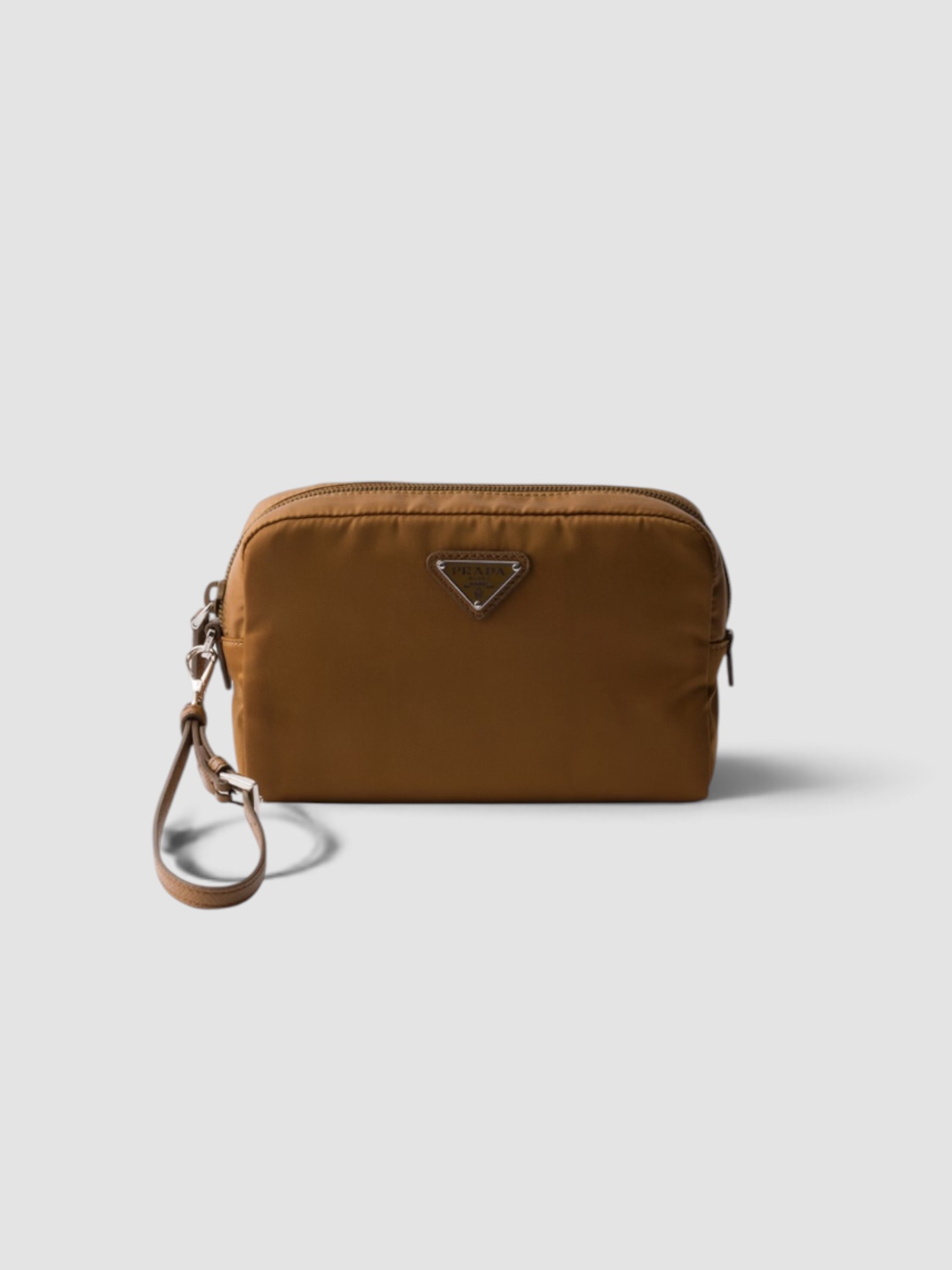 Prada Small Re-Nylon Pouch in caramel.