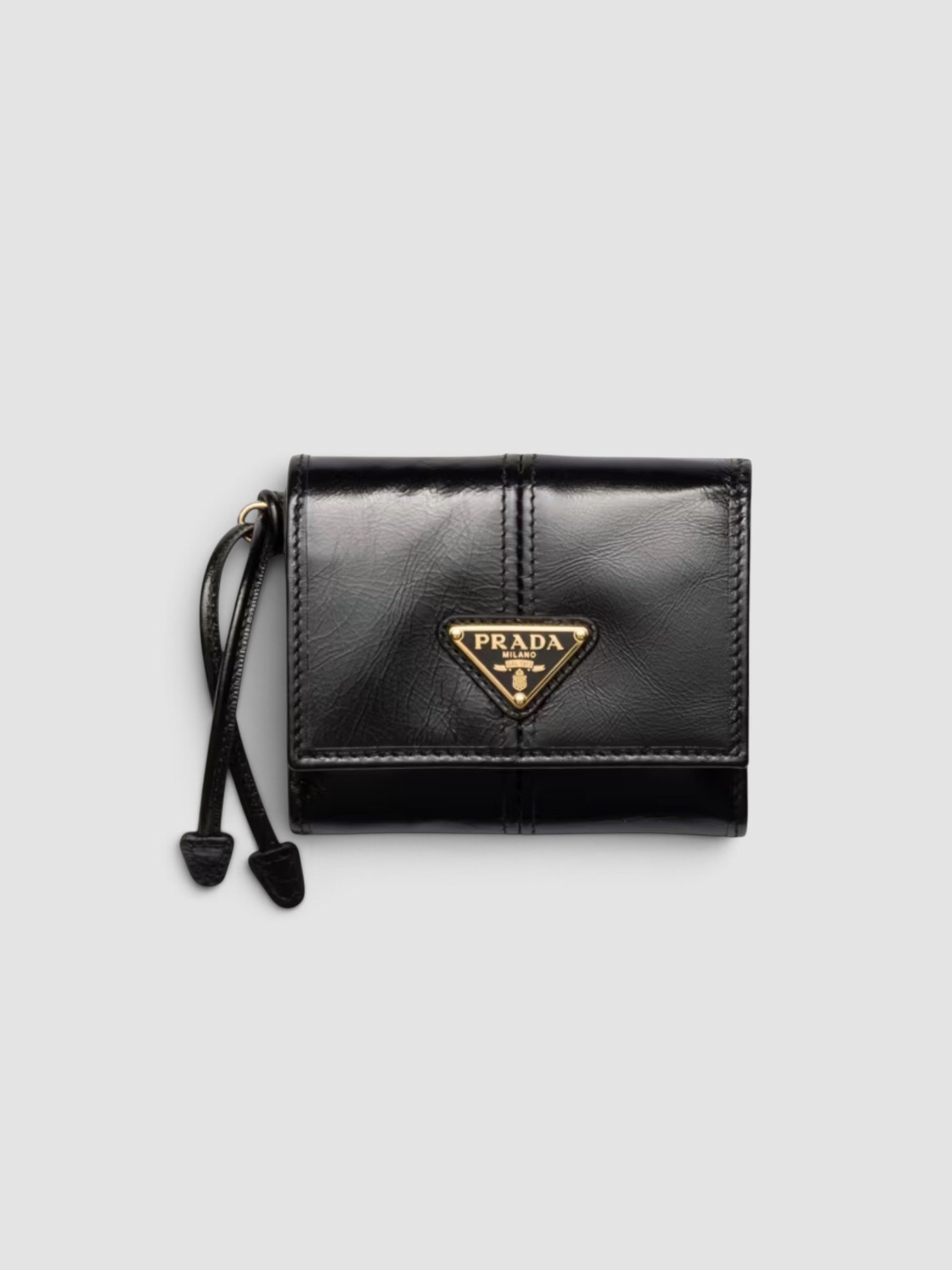 Prada Soft Lux Trifold Leather Wallet in black.