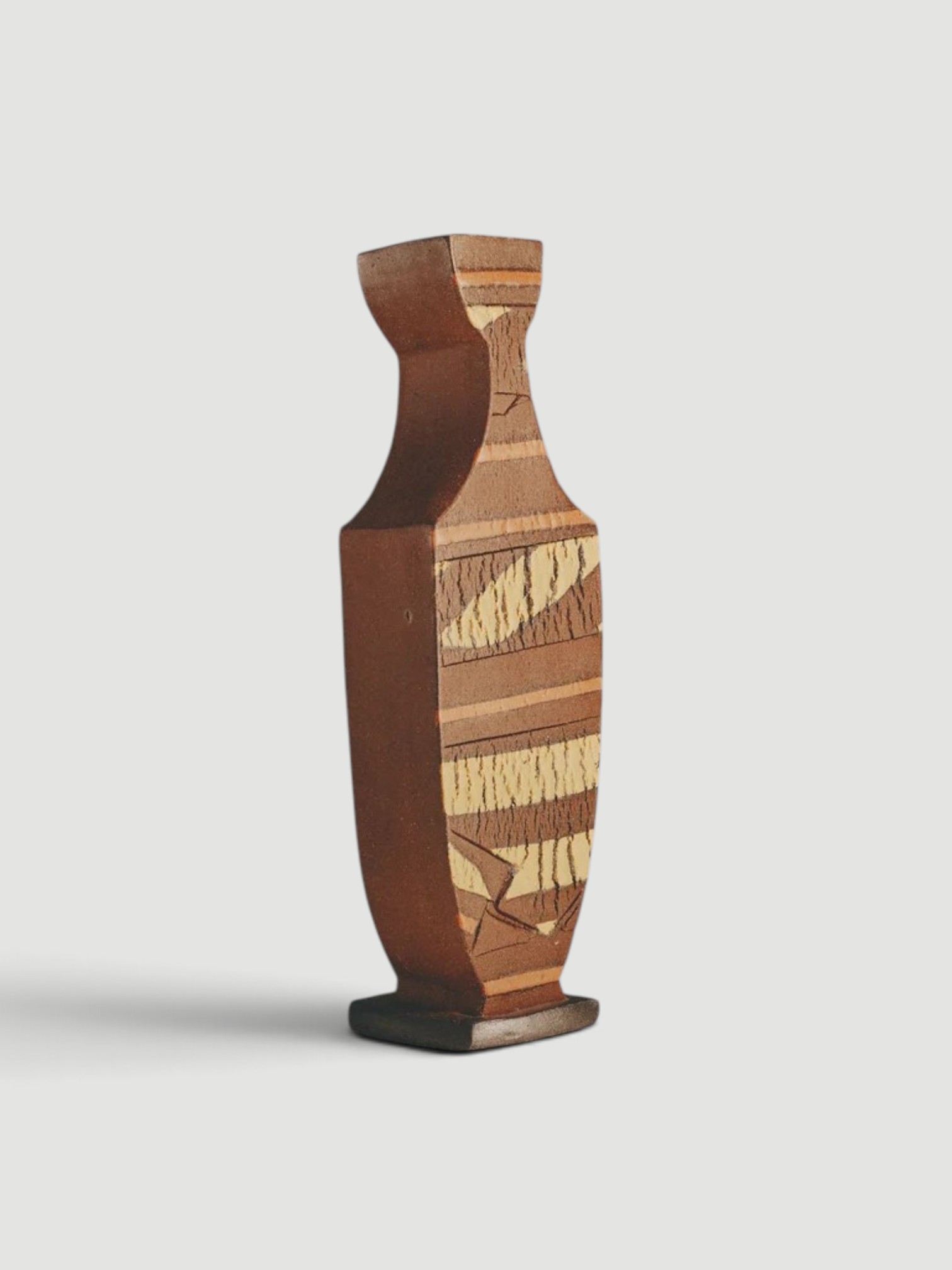 Quarters Tall Abstracted Vase in brown.