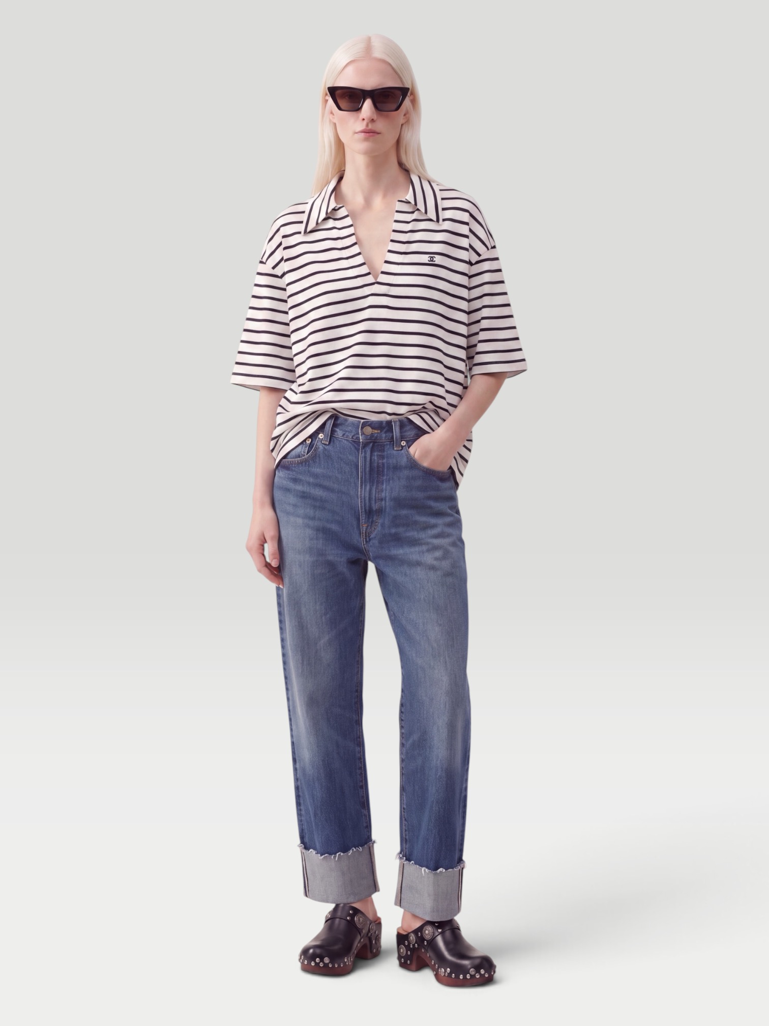 R13 Cuffed X-Boyfriend Jeans in selvedge blue, worn with Jacquemus Cuadro Asymmetric Striped Cotton Shirt, Bottega Veneta Drop Squared Sunglasses. Styled by Sharon Lombardo for FDV Concierge.