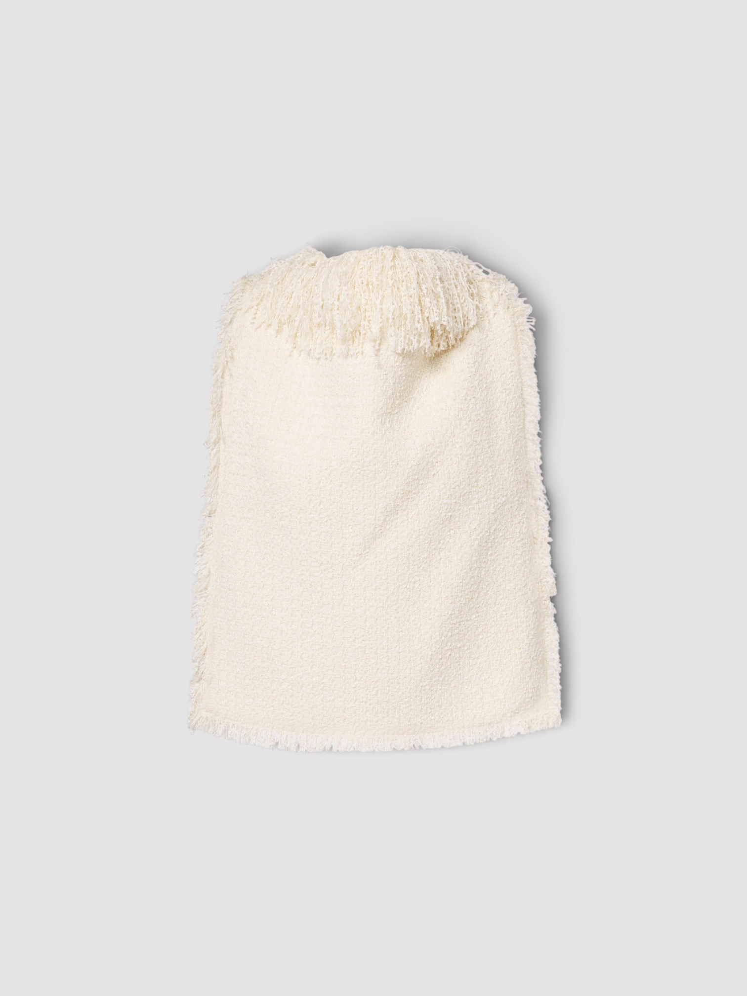 Róhe Fringed Bouclé Top in cream. Styled by Sharon Lombardo for FDV Concierge.