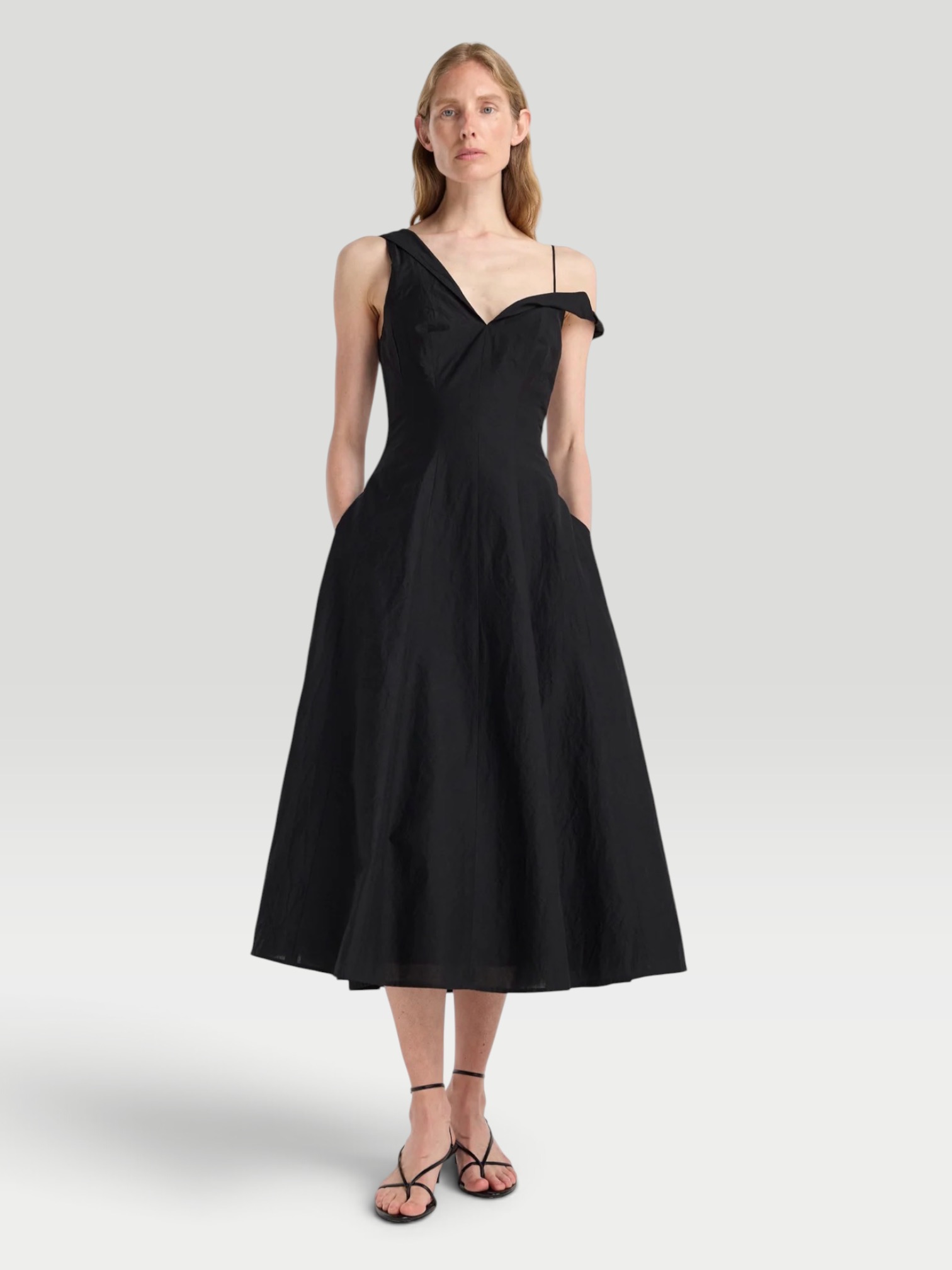 Róhe Twisted Shoulder Dress in black. Styled by Sharon Lombardo for FDV Concierge.