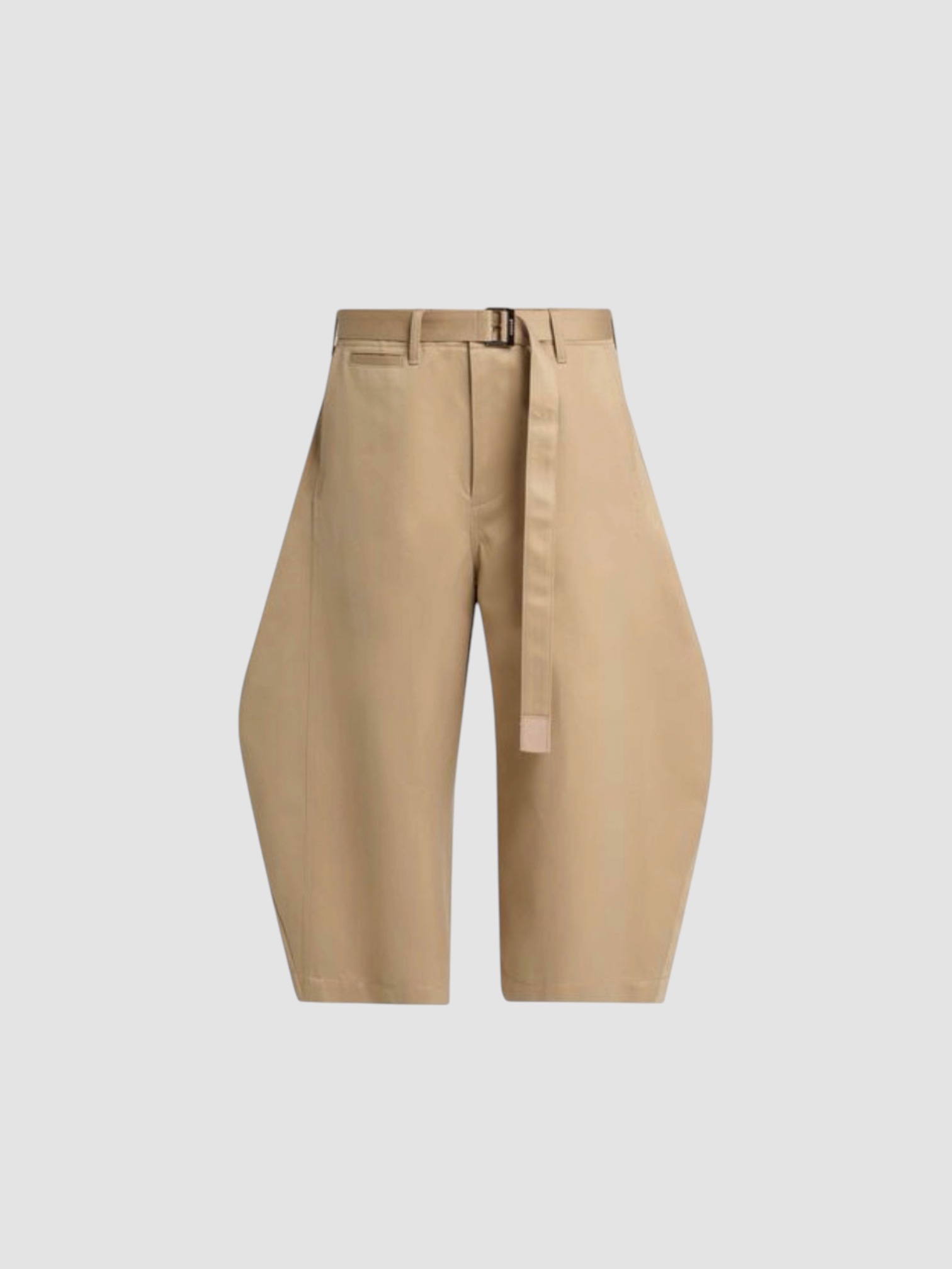 Sacai Belted Cotton Chino Barrel-Leg Crop Pants in beige. Styled by Sharon Lombardo for FDV Concierge.