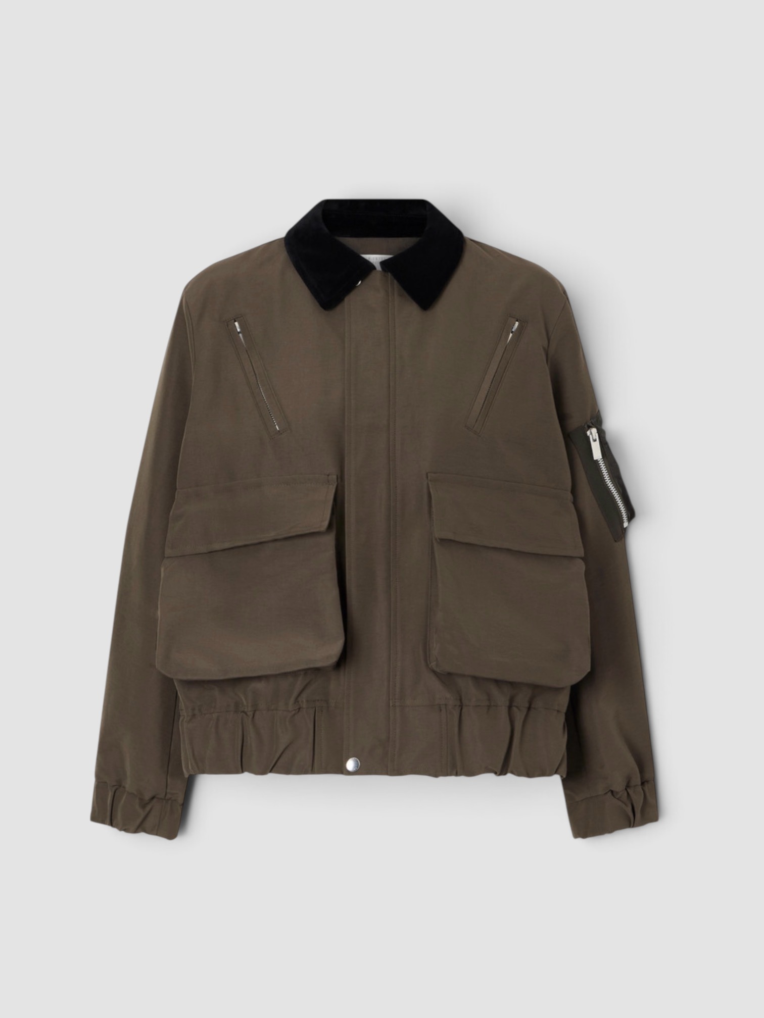 Sacai Cotton-Blend Shell Jacket in brown. Styled by Sharon Lombardo for FDV Concierge.
