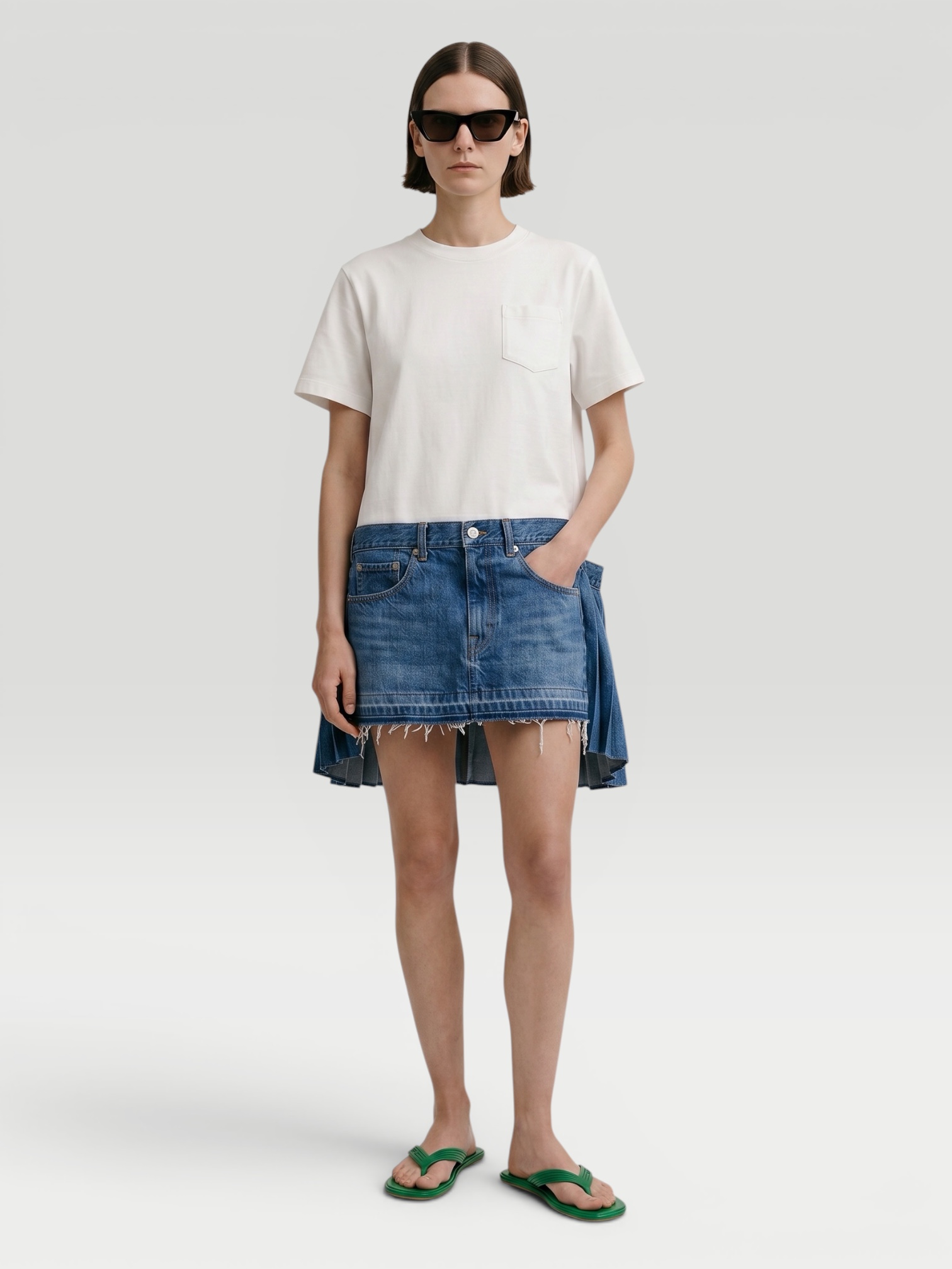 Sacai Mixed-Media Denim Mini T-Shirt Dress in off white, worn with Maison MIHARA YASUHIRO Sneaker. Styled by Sharon Lombardo for FDV Concierge.