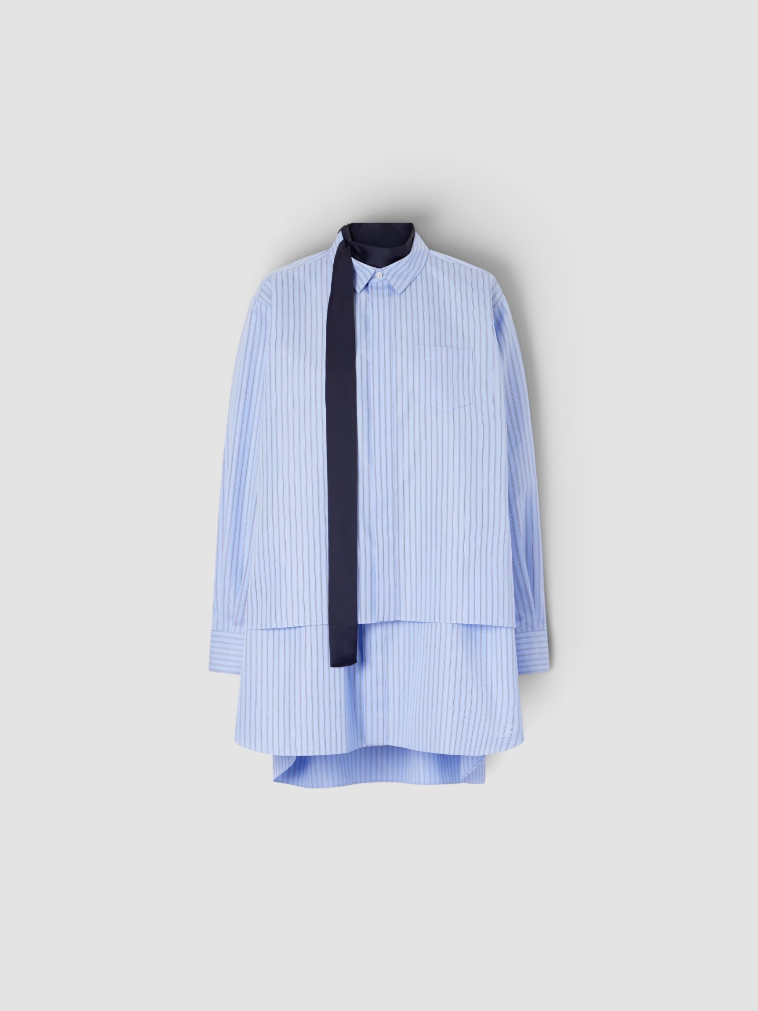 Sacai Scarf-Detailed Striped Cotton-Blend Poplin Mini Dress in blue. Styled by Sharon Lombardo for FDV Concierge.