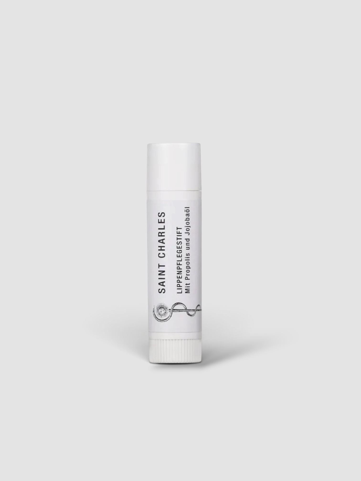 Saint Charles Propolis Lip Care Stick in white.