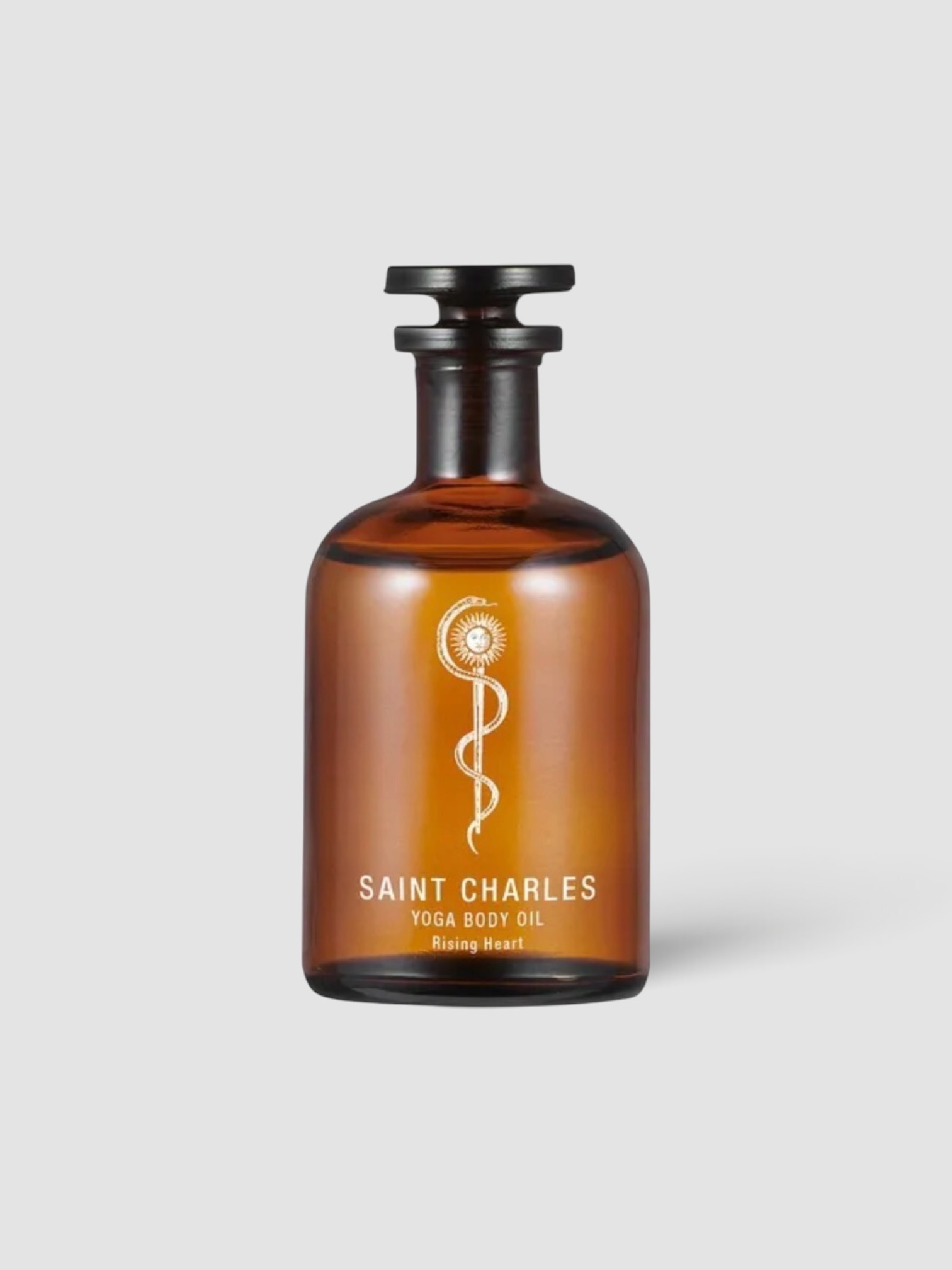 Saint Charles Yoga Body Oil Rising Heart in amber.