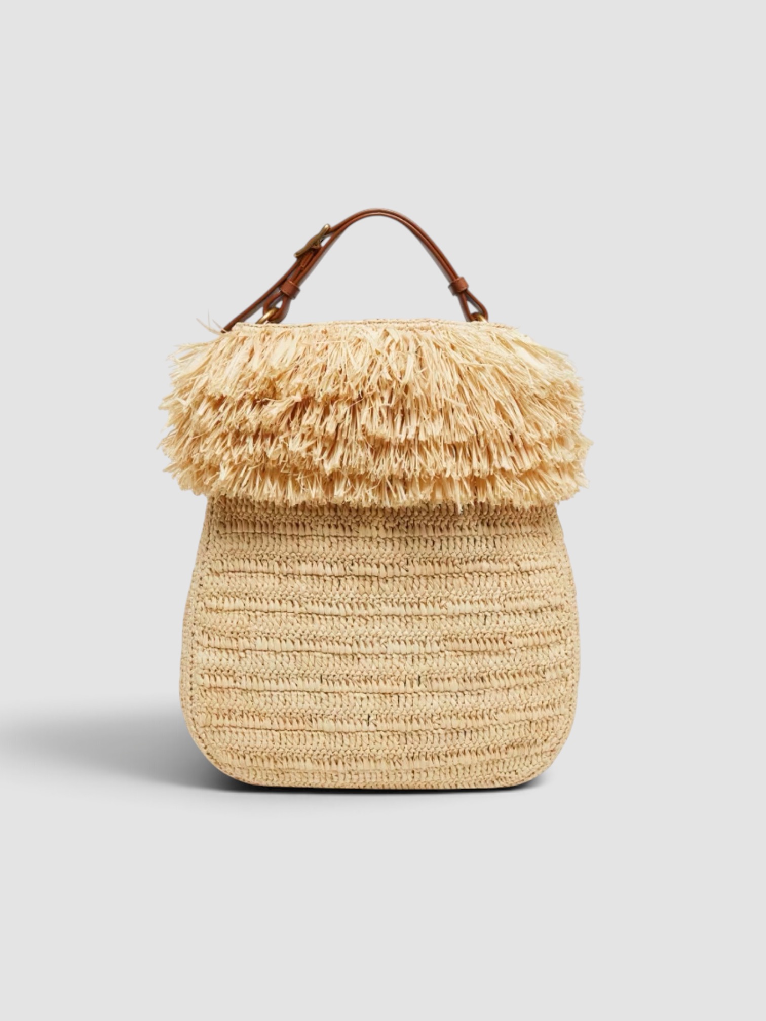 Saint Laurent Roady Fringed Raffia Shoulder Bag in natural/brick, worn with Totême Striped Shirtdress. Styled by Sharon Lombardo for FDV Concierge.