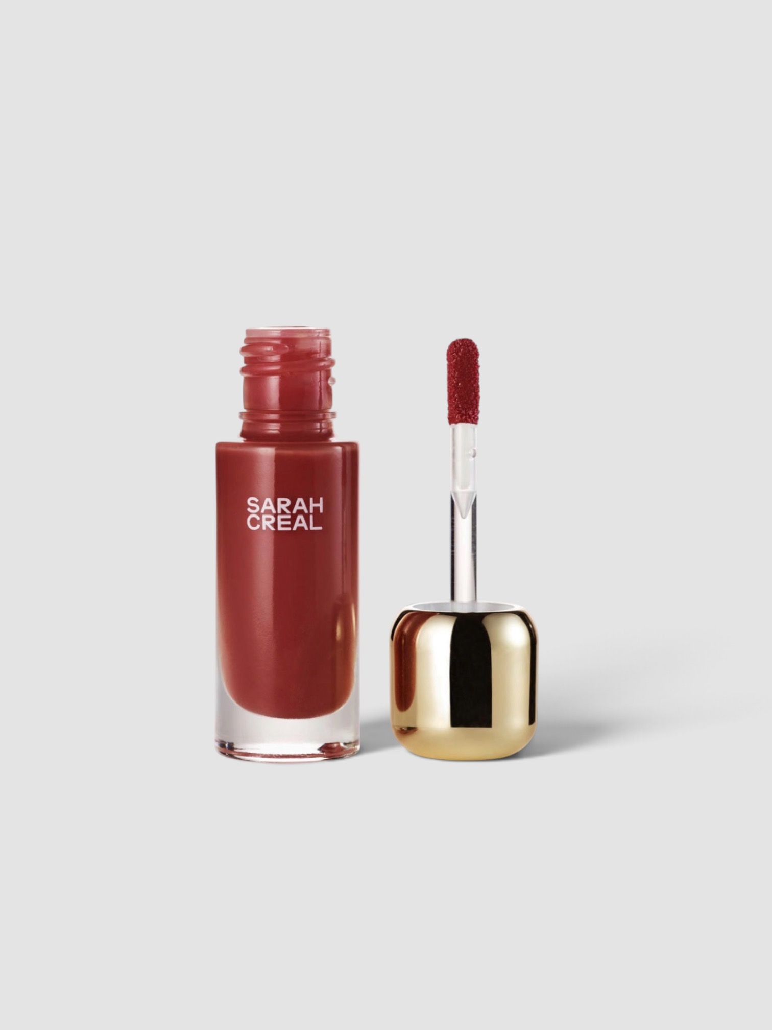Sarah Creal No Further Questions High Glide Peptide Lip Gloss in after hours.
