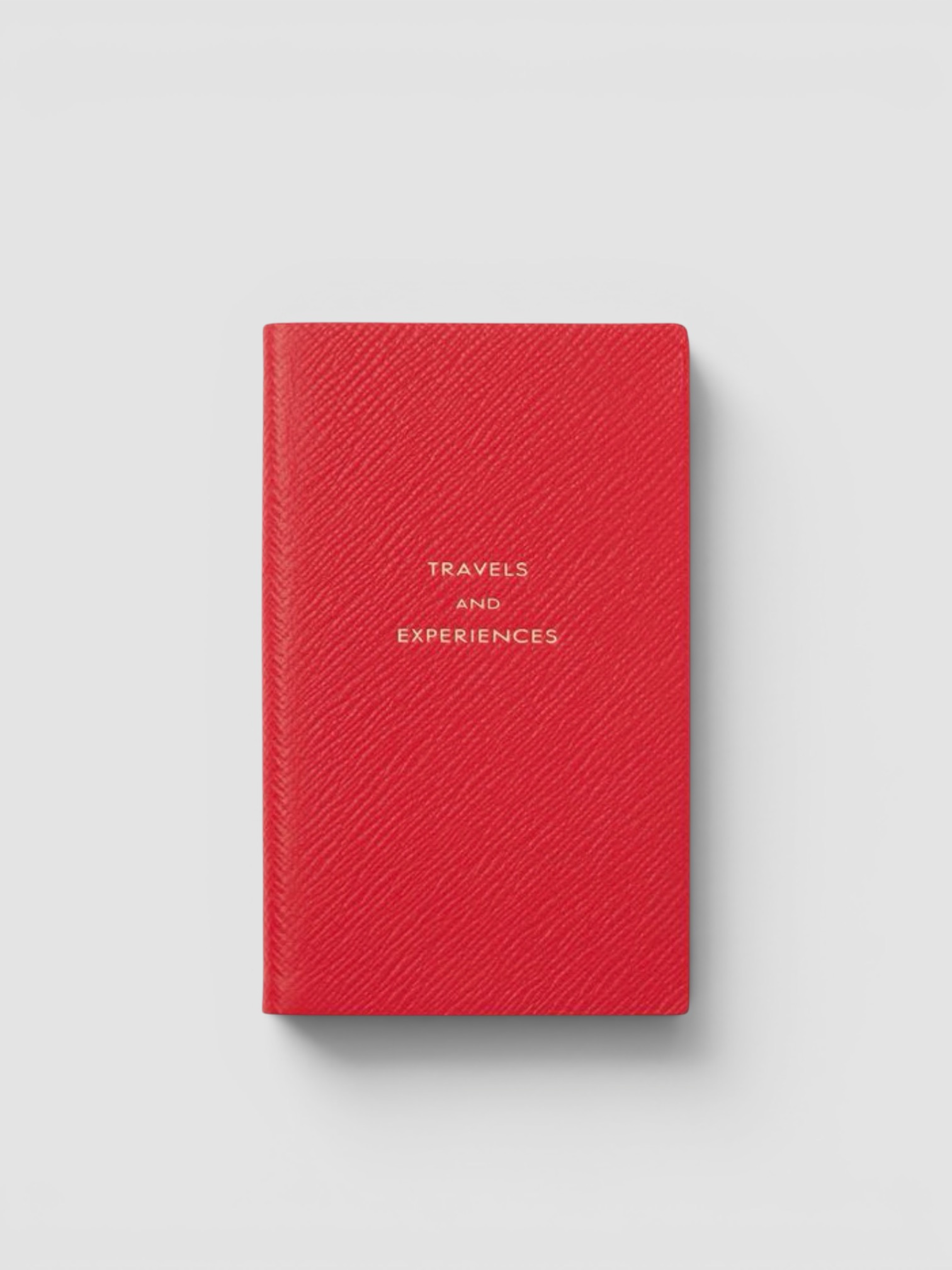 Smythson Travels and Experiences Panama Leather Notebook in red.
