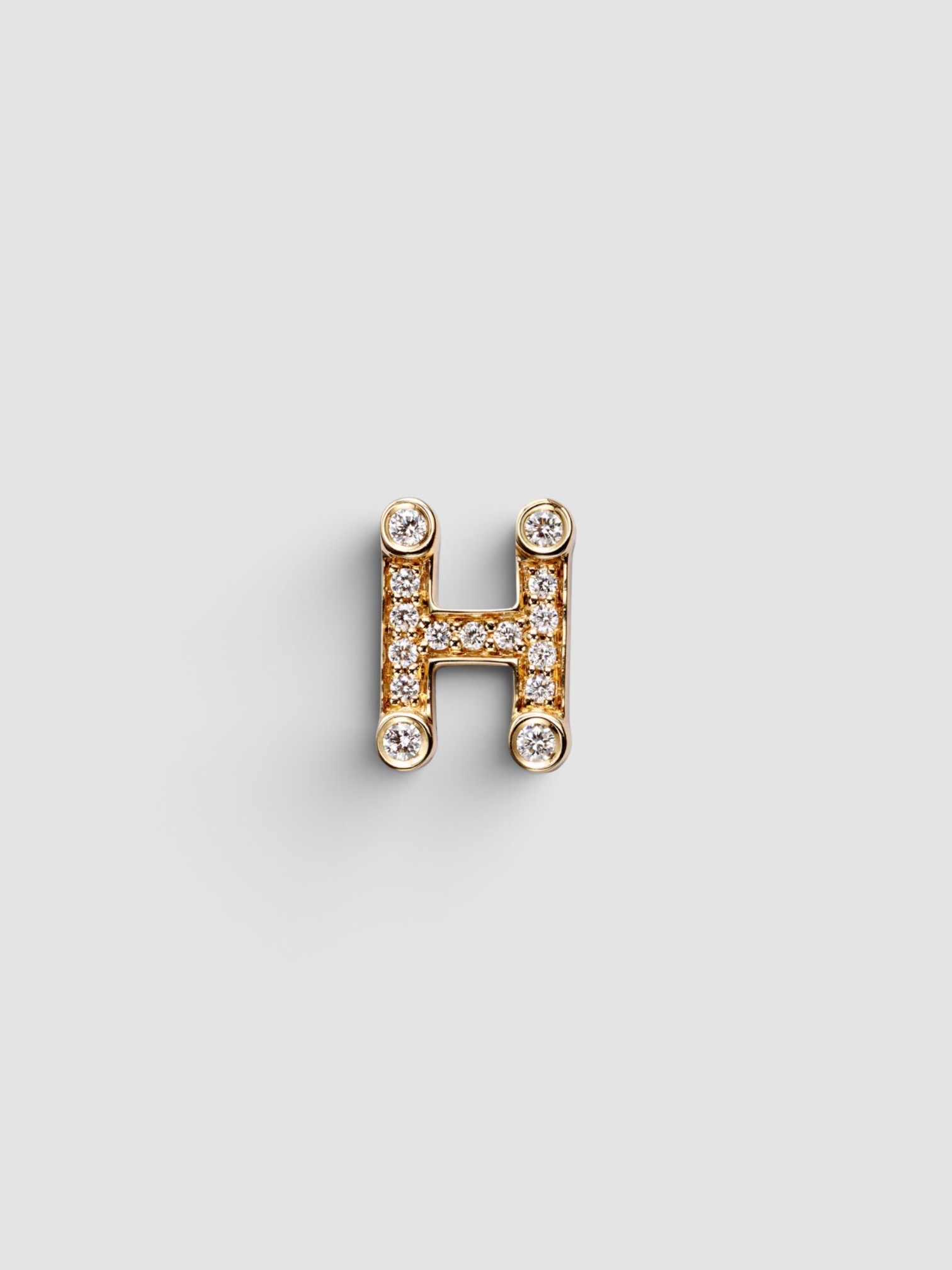 Sophie Bille Brahe Initial Petite H Single Earring in gold.