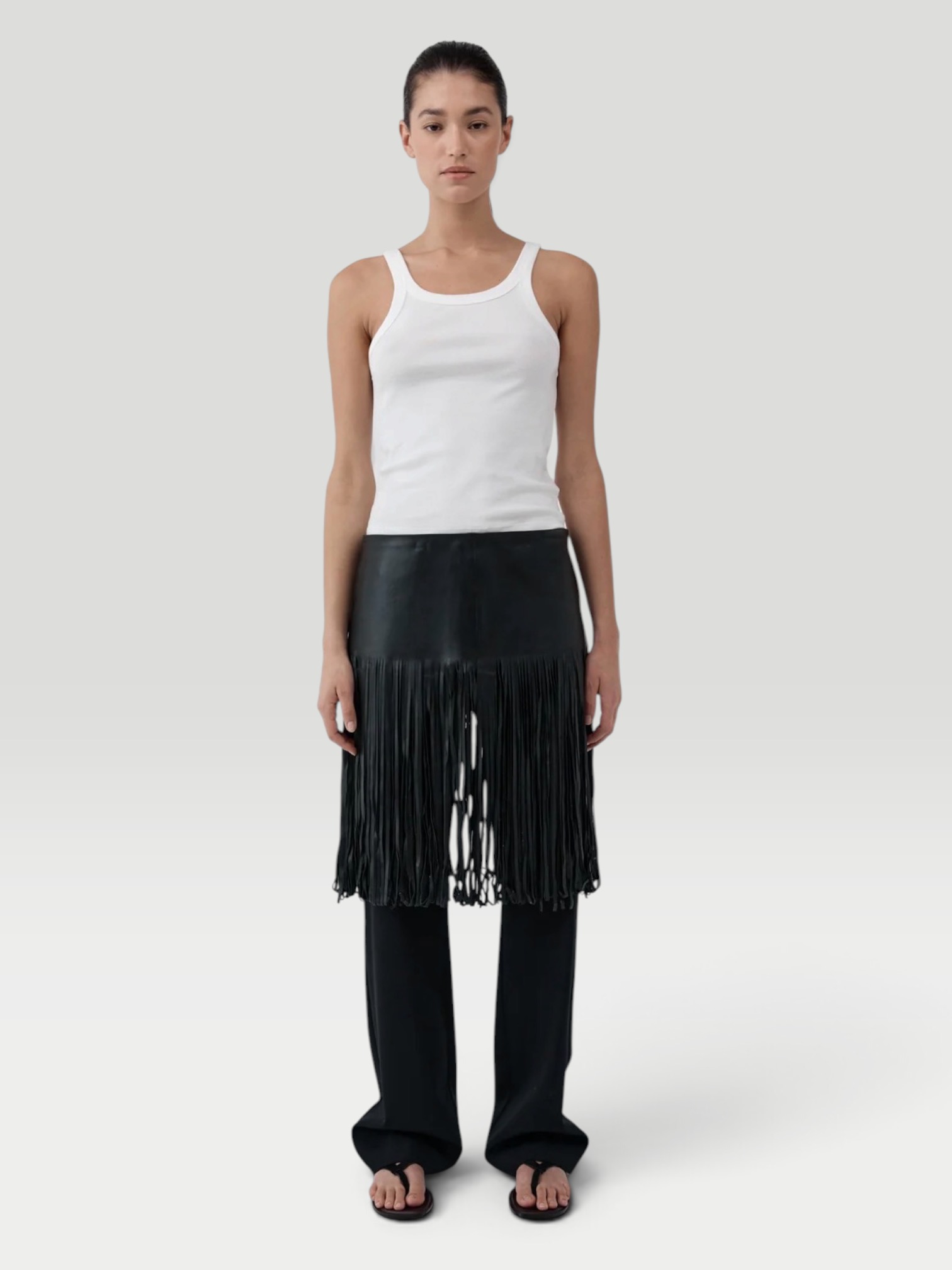St. Agni Fringe Belt Skirt in black. Styled by Sharon Lombardo for FDV Concierge.