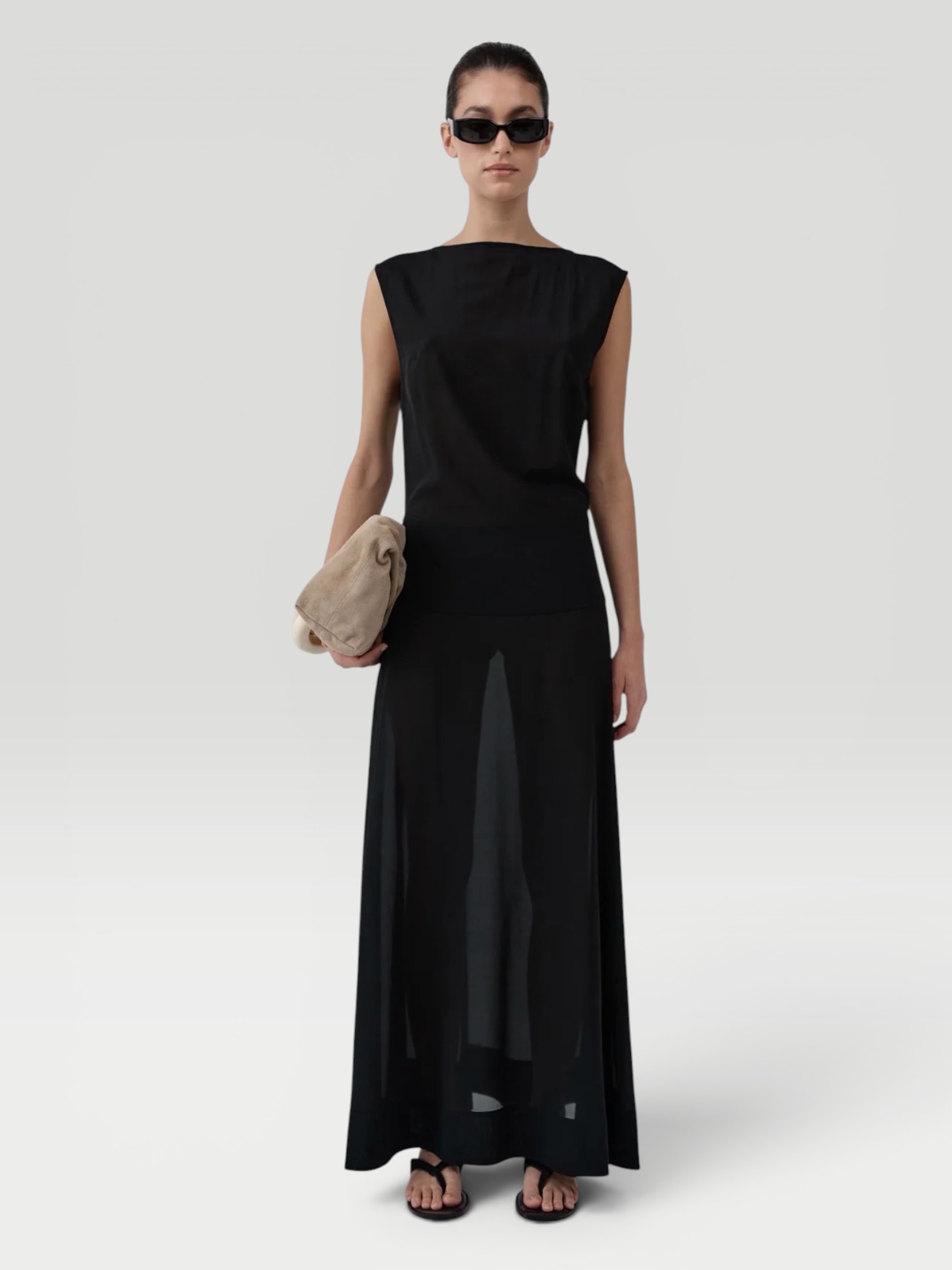 St. Agni Stretch Silk Bateau Dress in black, worn with Alaïa Heel Thong Mules in Velvet. Styled by Sharon Lombardo for FDV Concierge.