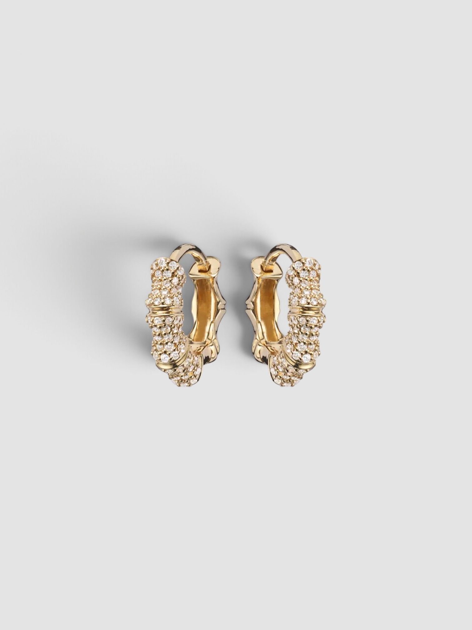 Stone and Strand 14kt Gold Earrings With Diamonds in gold.