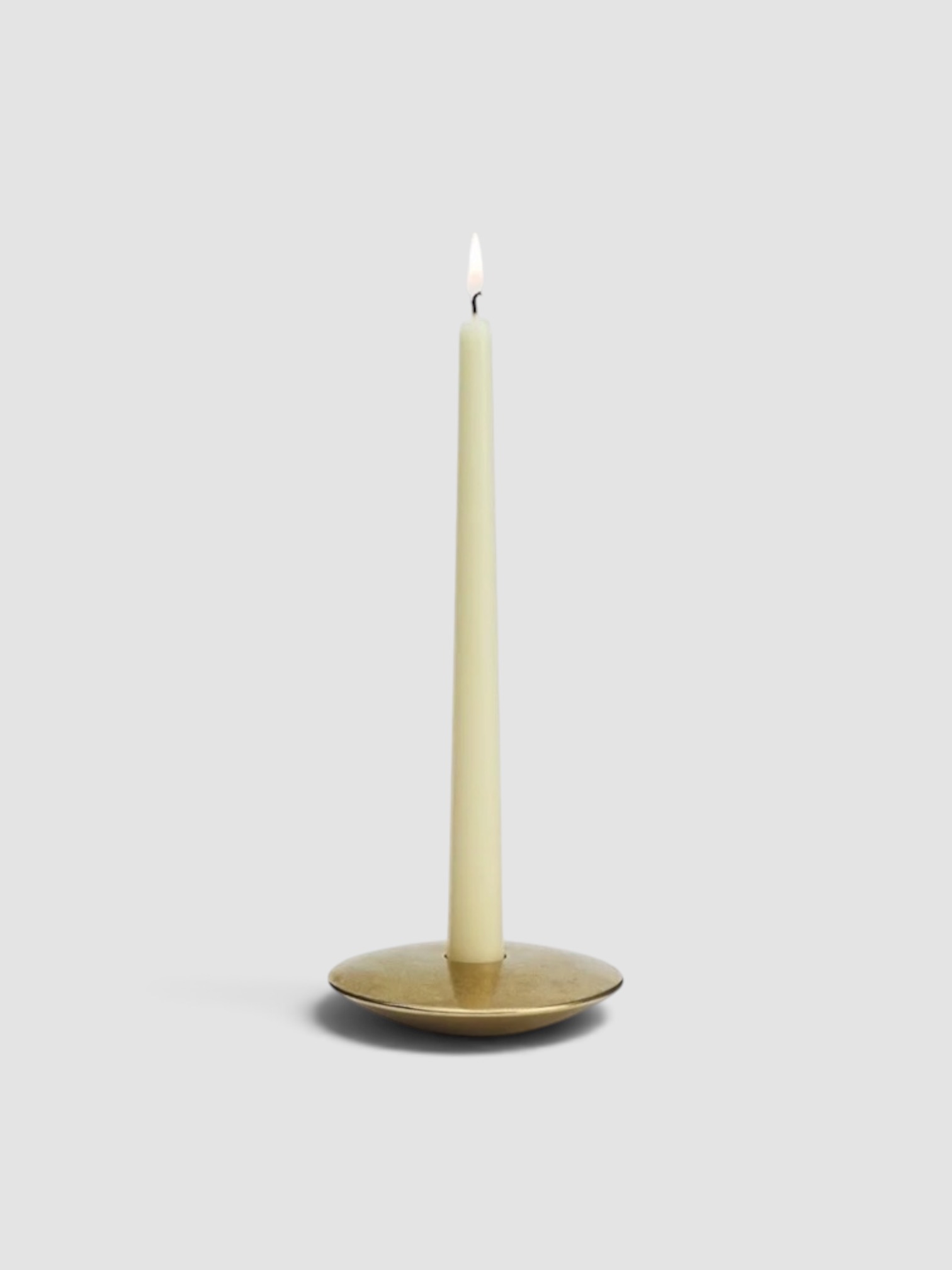 Studio Henry Wilson Almendres Candle Holder in gold.