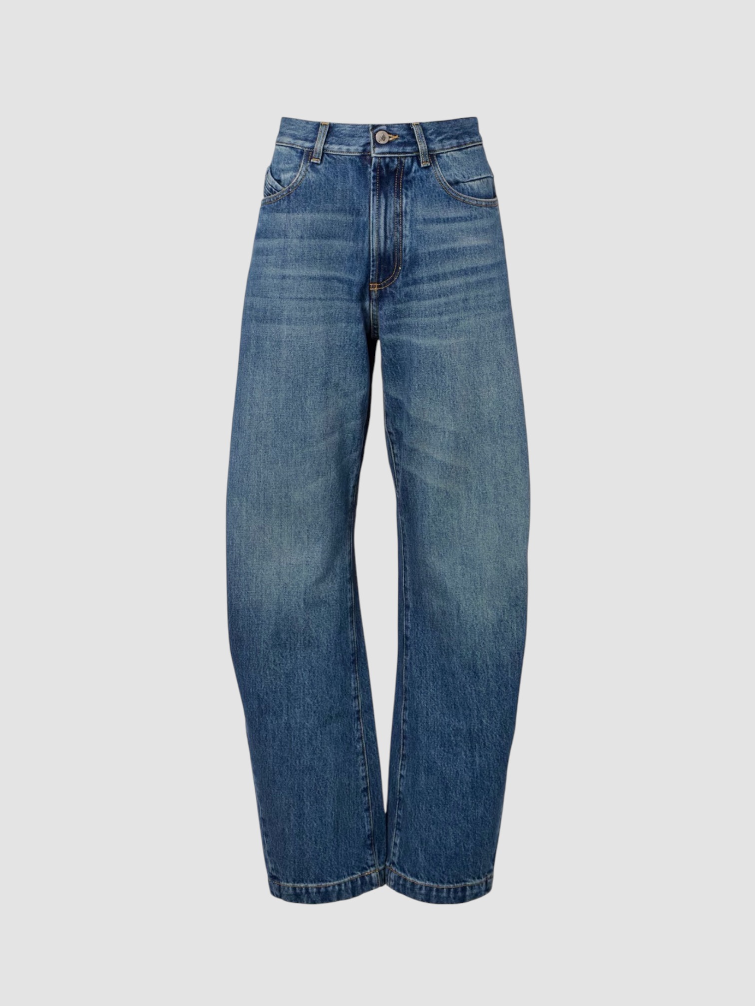 The Attico Mid-Rise Barrel-Leg Jeans in blue. Styled by Sharon Lombardo for FDV Concierge.