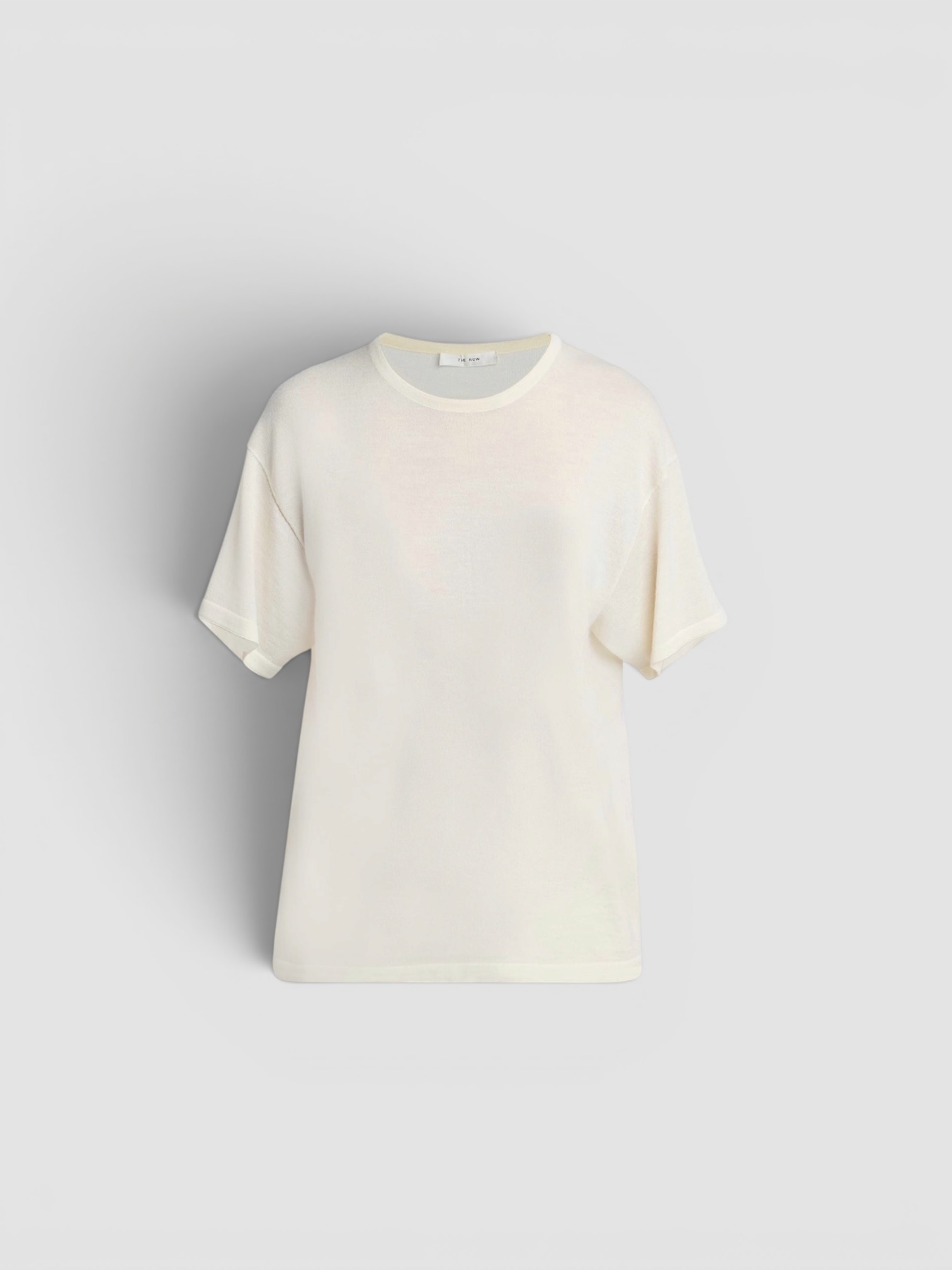 The Row Nonas Cashmere Top in cream. Styled by Sharon Lombardo for FDV Concierge.