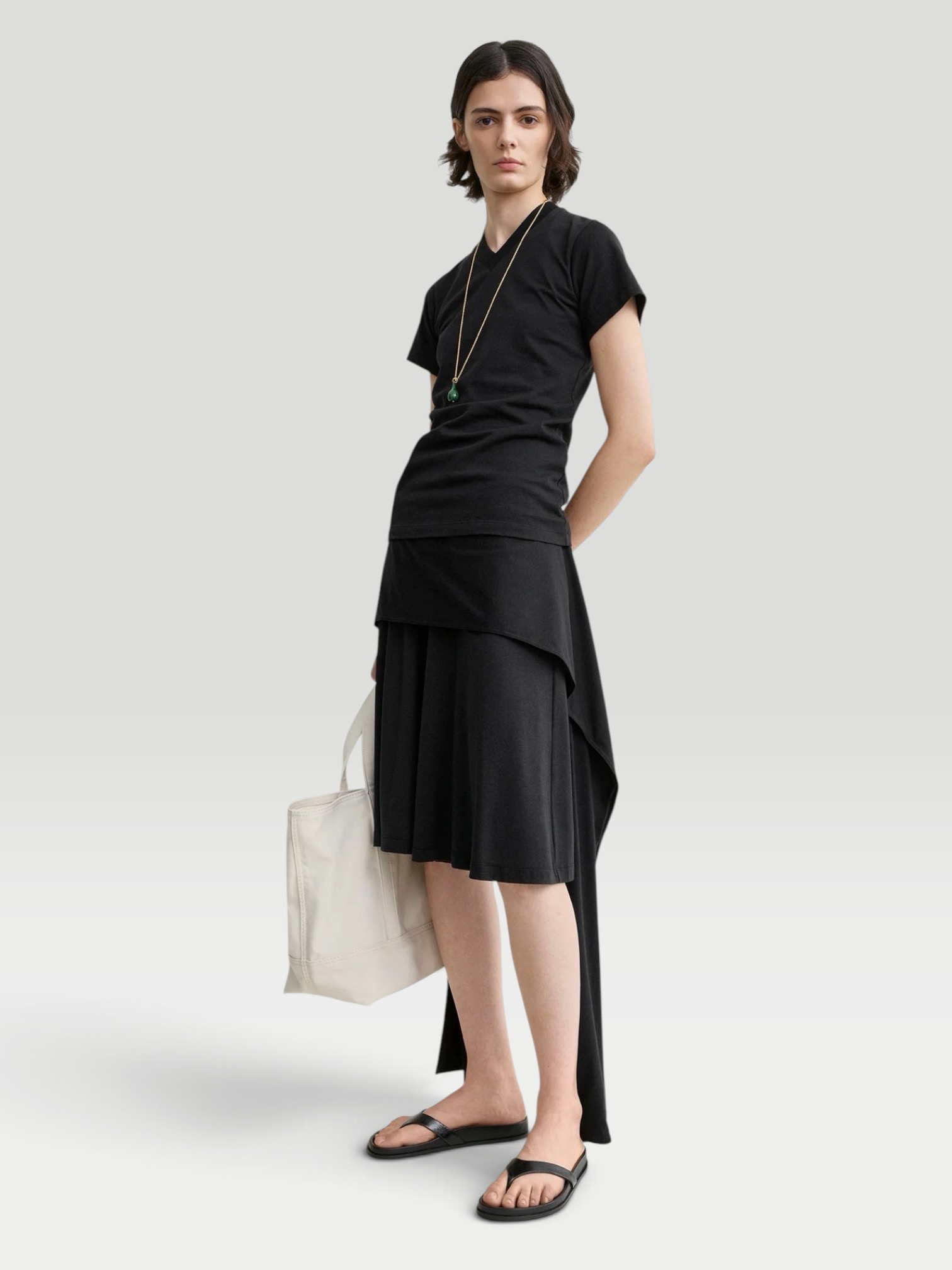 Totême Tie-Waist Jersey Shorts in black. Styled by Sharon Lombardo for FDV Concierge.