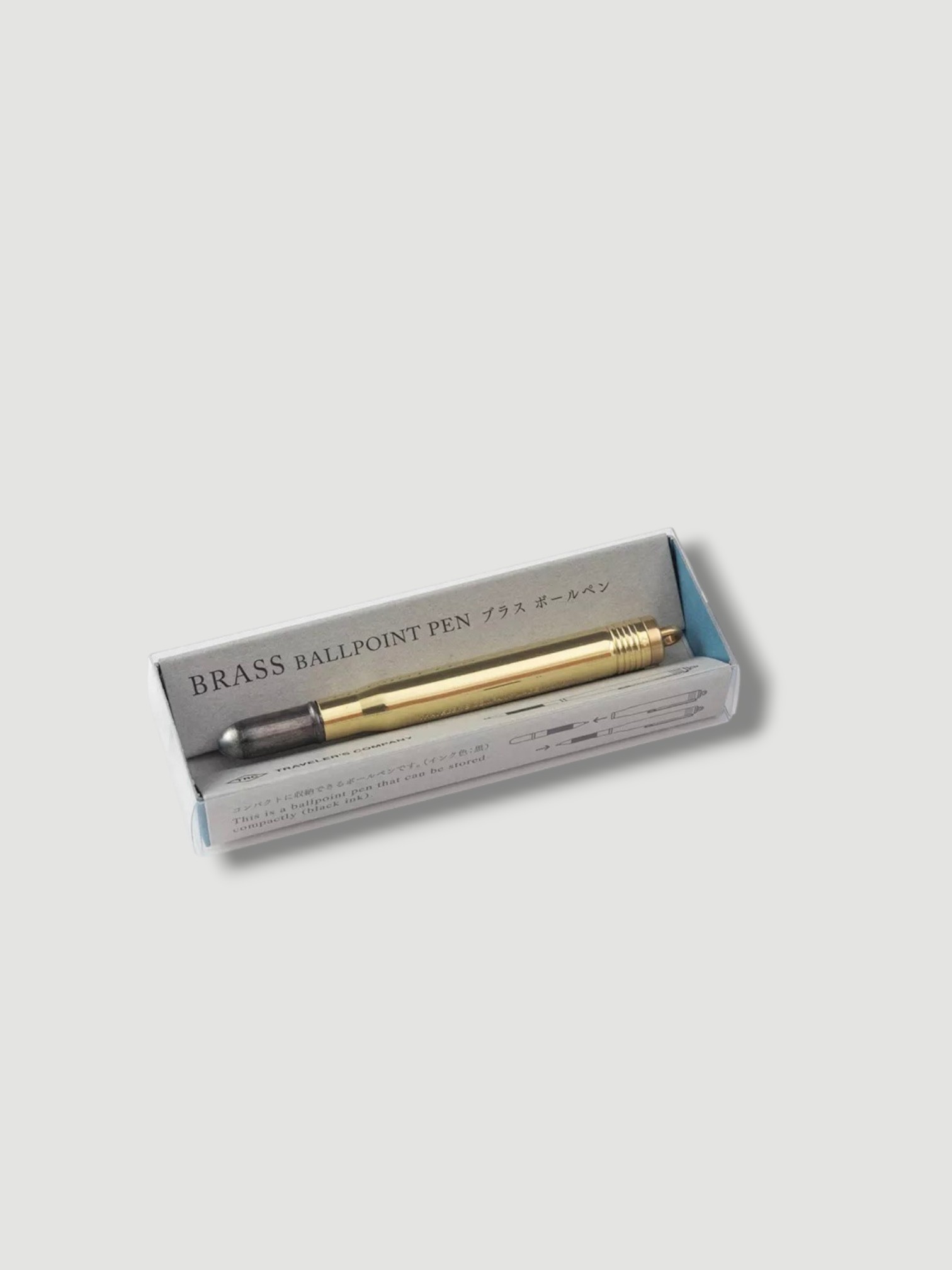 Traveler's Company Logo-engraved Brass Rollerball Pen in brass.