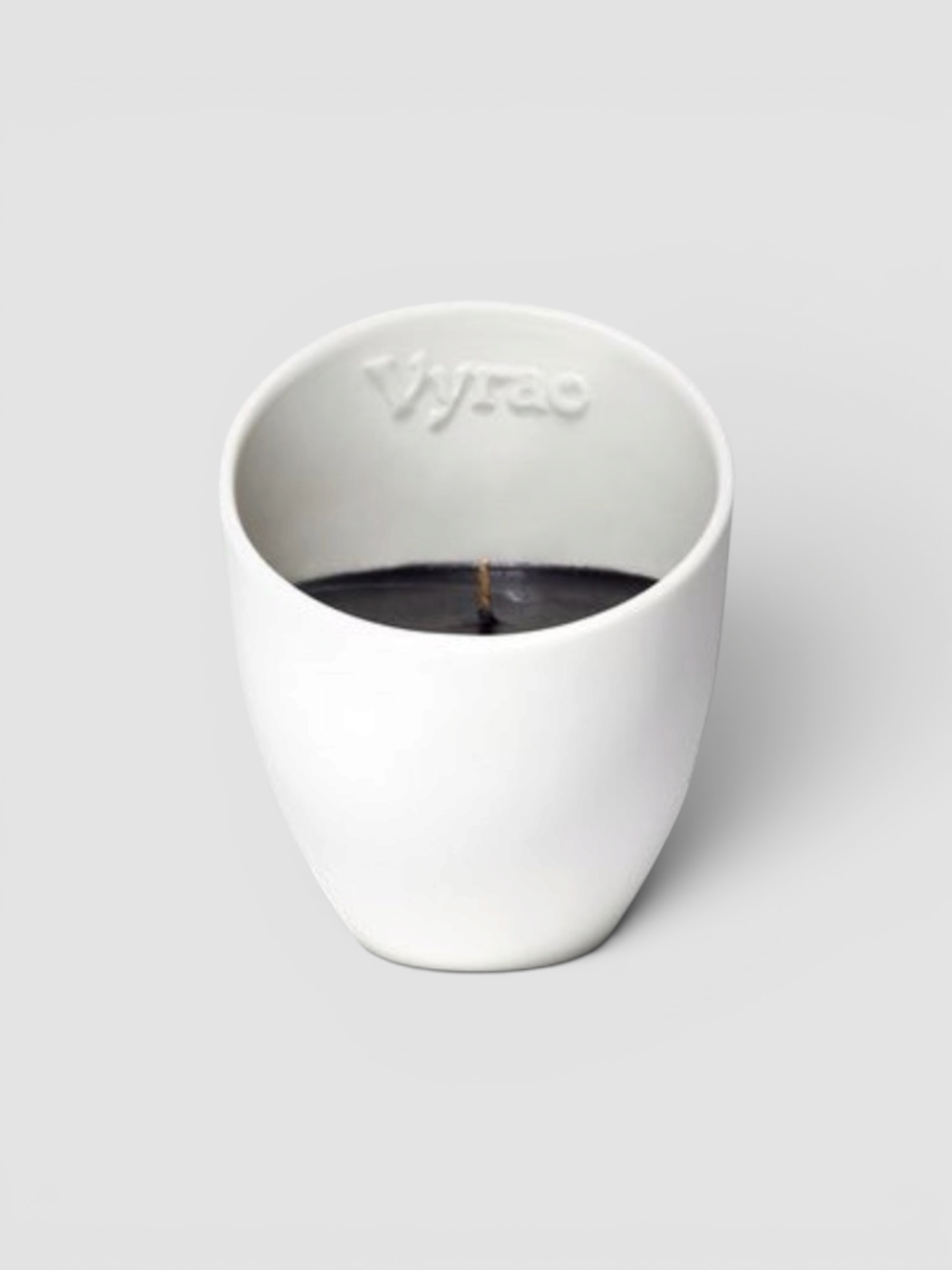 Vyrao Ember Candle in white.