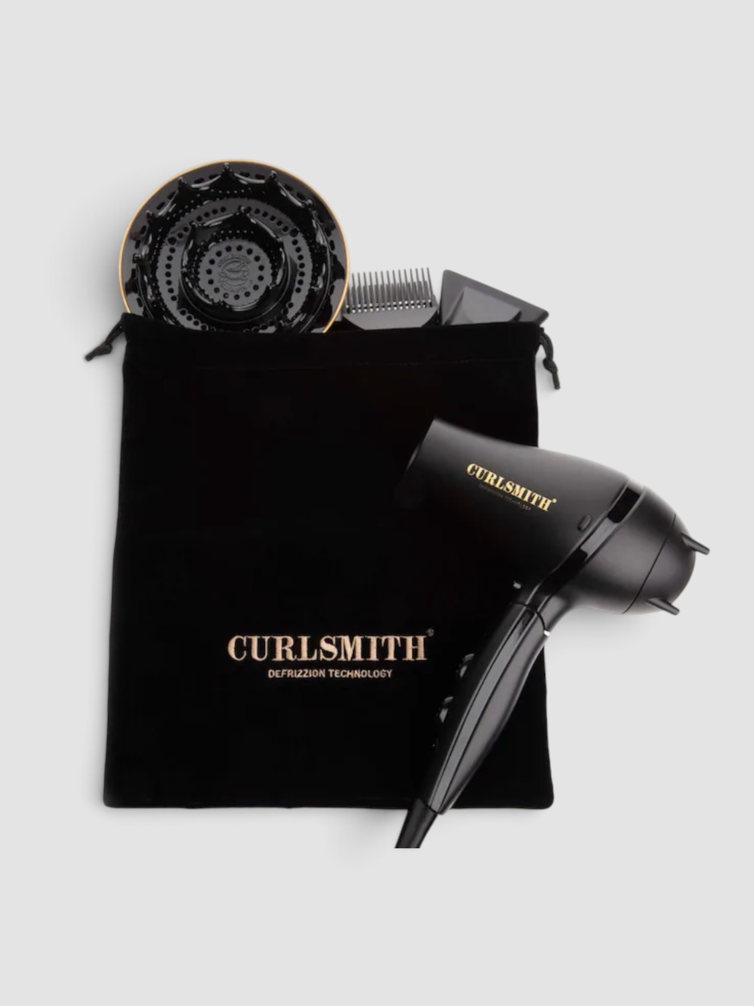 Curlsmith Defrizzion Travel Hair Dryer & Diffuser, worn with Maison Margiela Oversized Cotton Poplin Shirt, Saint Jane Sun-Kissed Ritual Set, the day. Styled by Sharon Lombardo for FDV Concierge.