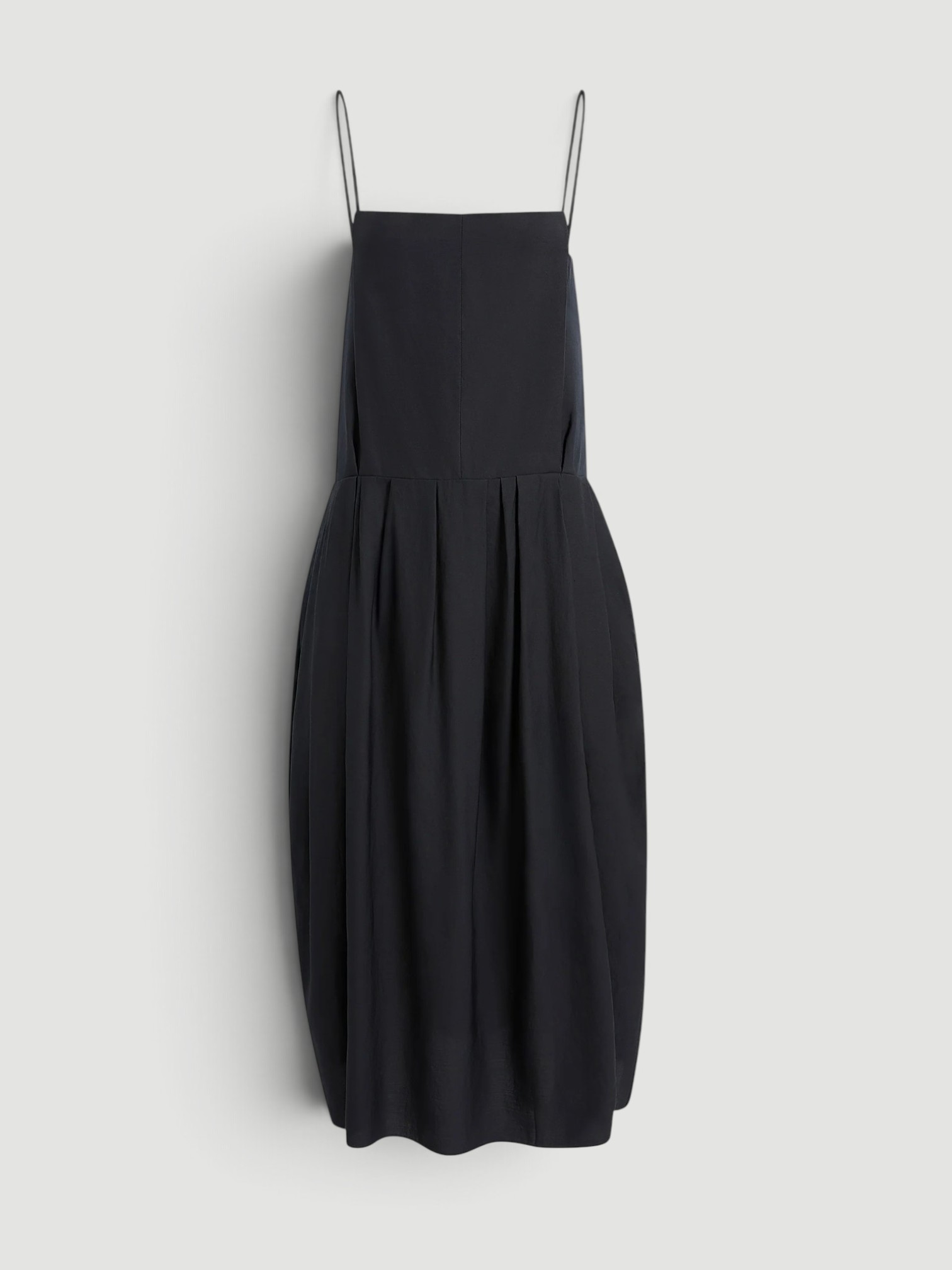 Khaite Adira Dress in black. Styled by Sharon Lombardo for FDV Concierge.