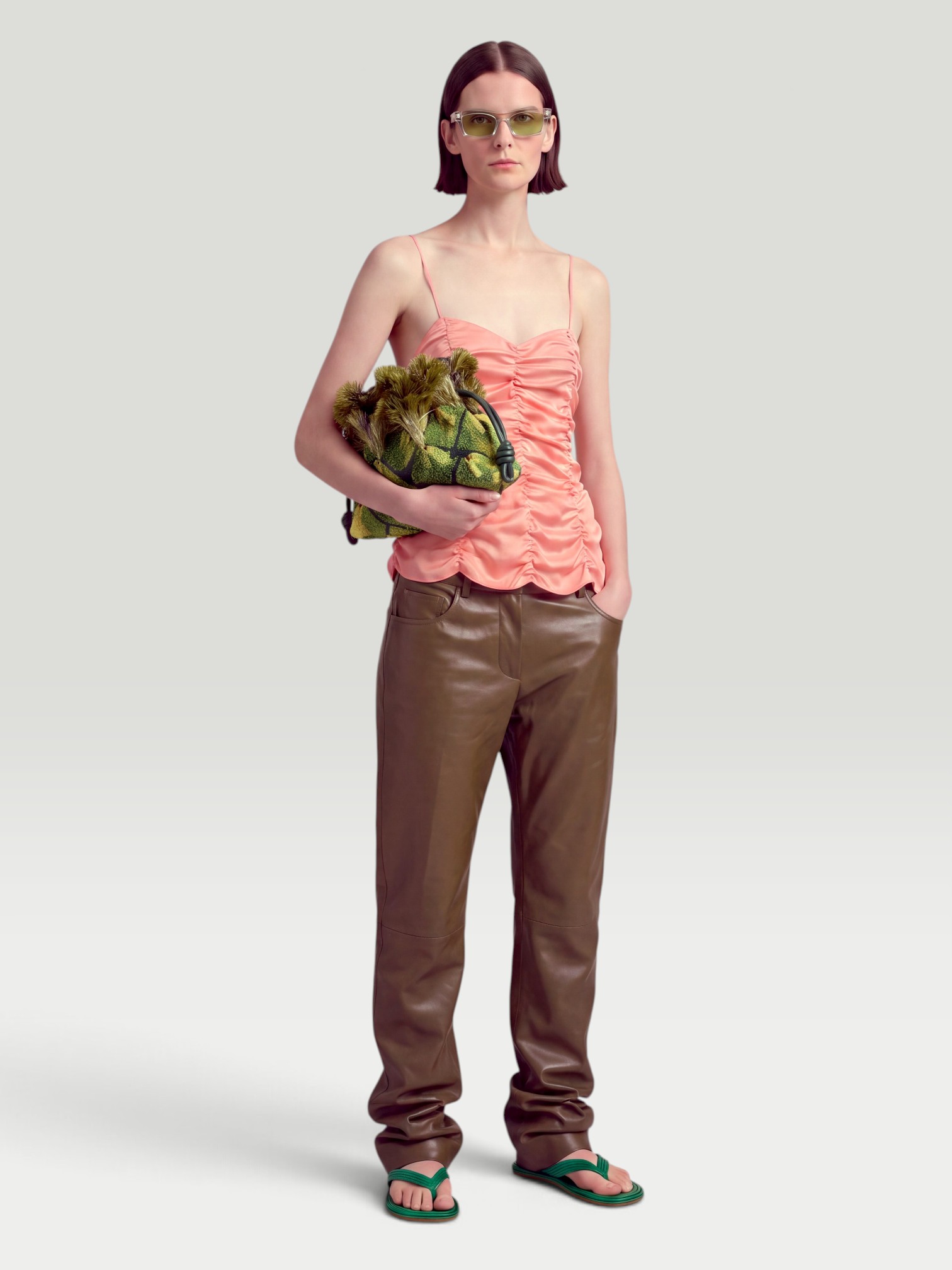 Khaite Inara Top in coral. Styled by Sharon Lombardo for FDV Concierge.
