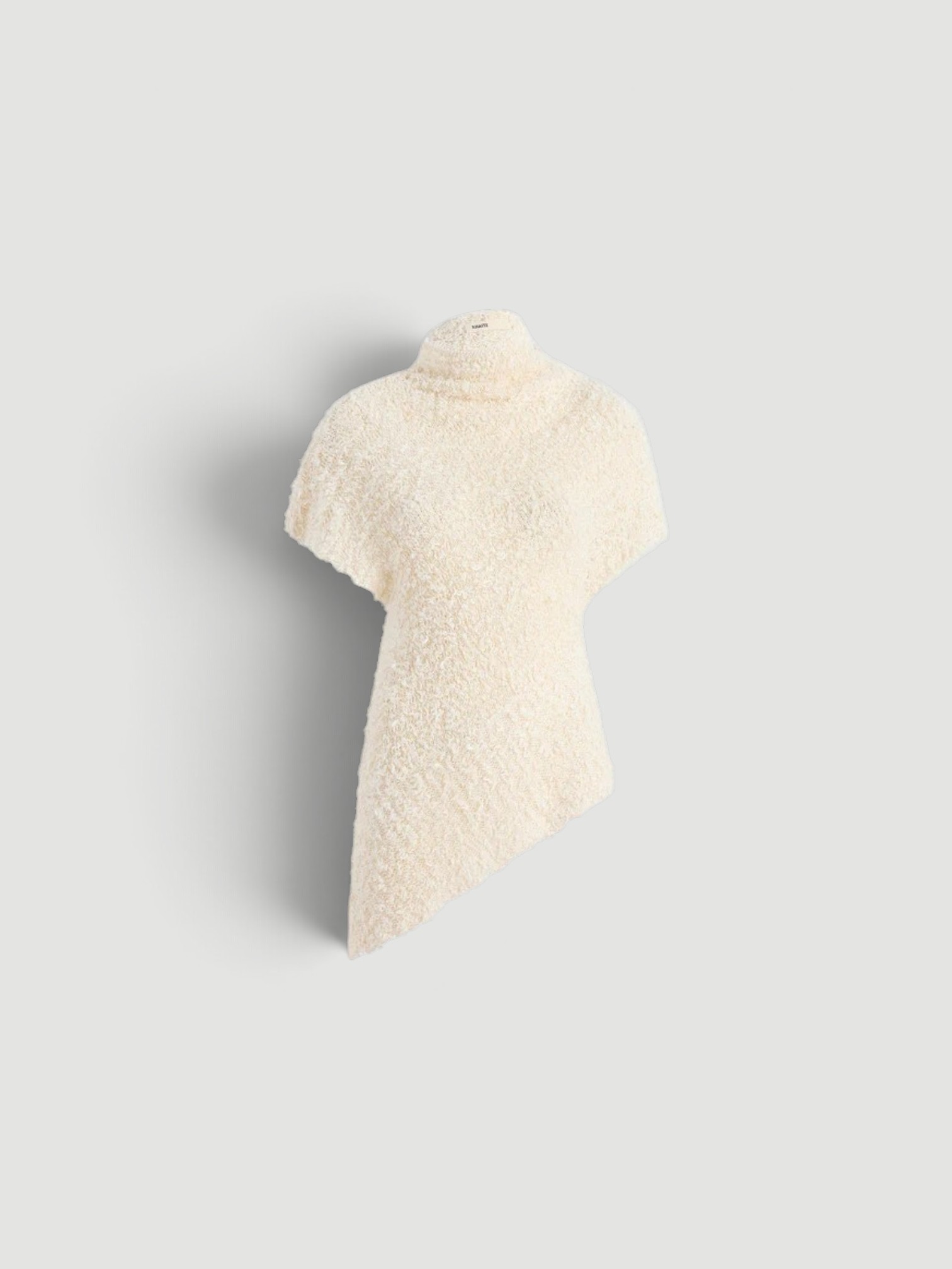 Khaite Rhodes Top in ivory. Styled by Sharon Lombardo for FDV Concierge.