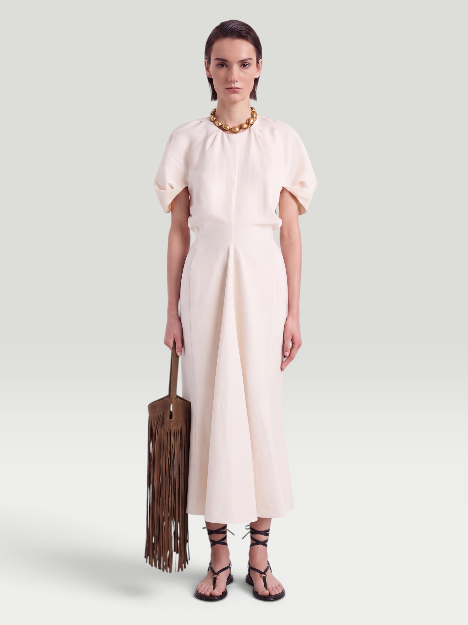 Khaite Ria Dress in cream. Styled by Sharon Lombardo for FDV Concierge.