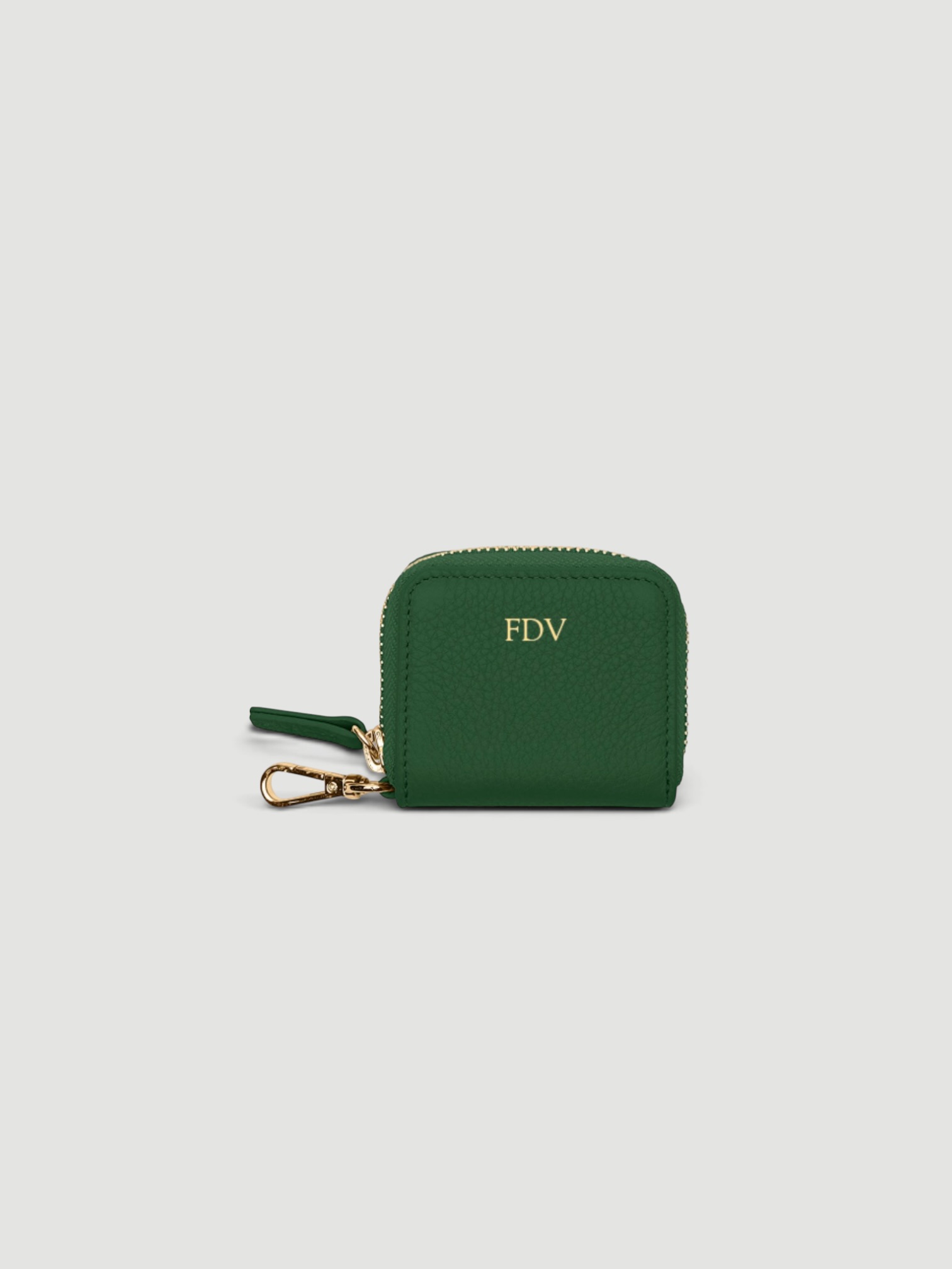 Leatherology Portable Wristlet AirPod Case in green.