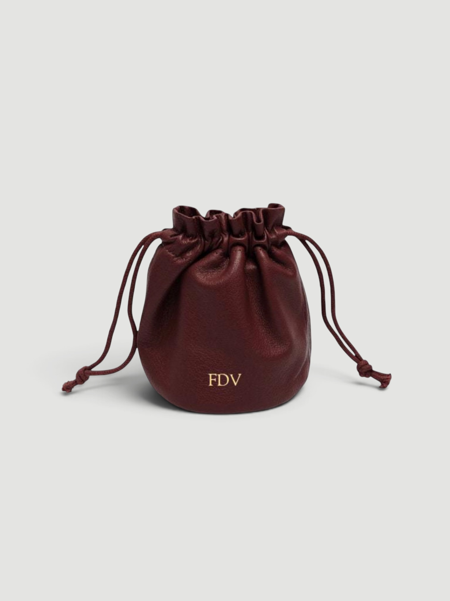 Leatherology Round Drawstring Pouch in bordeaux.
