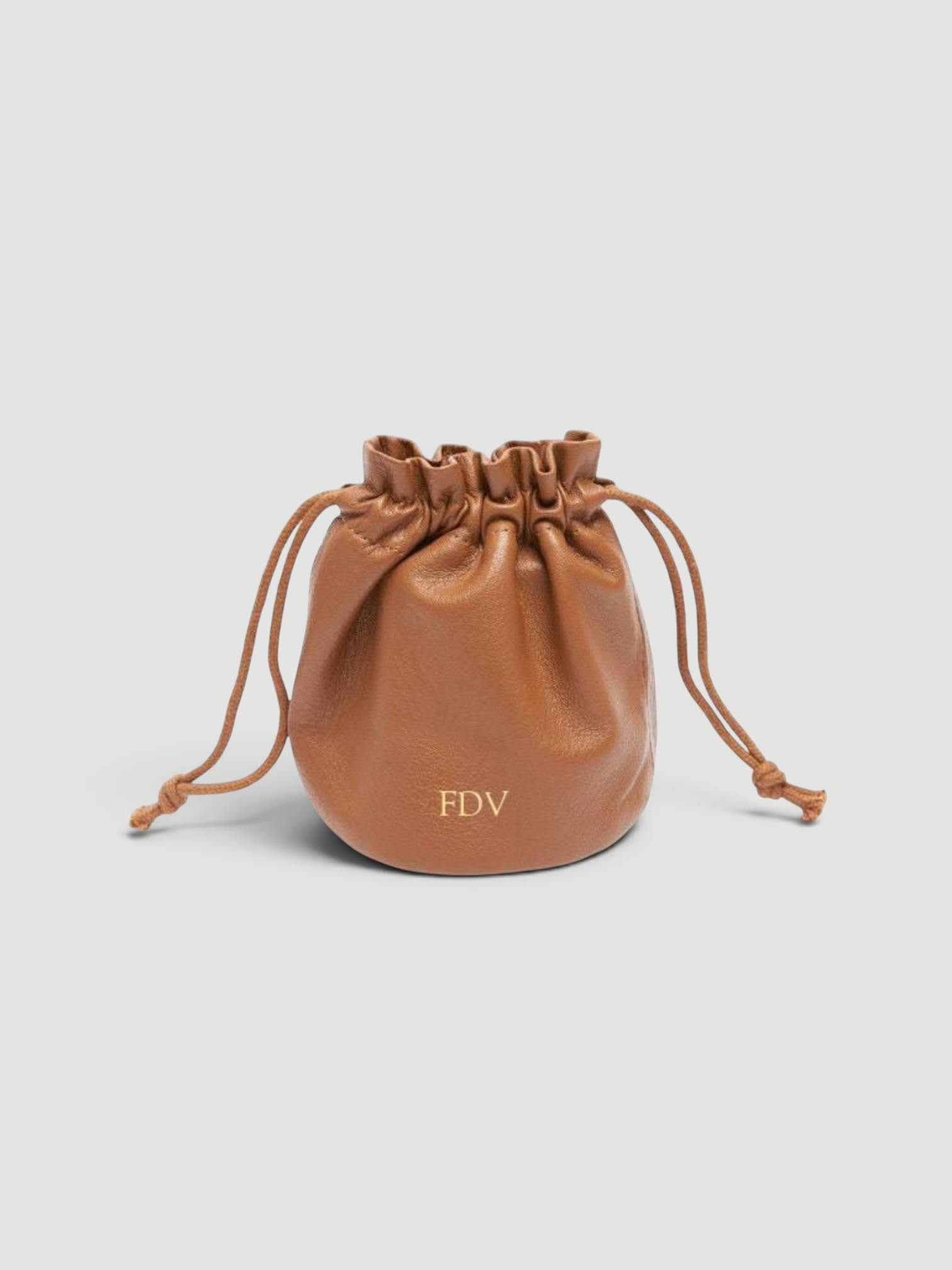 Leatherology Round Drawstring Pouch in saddle.