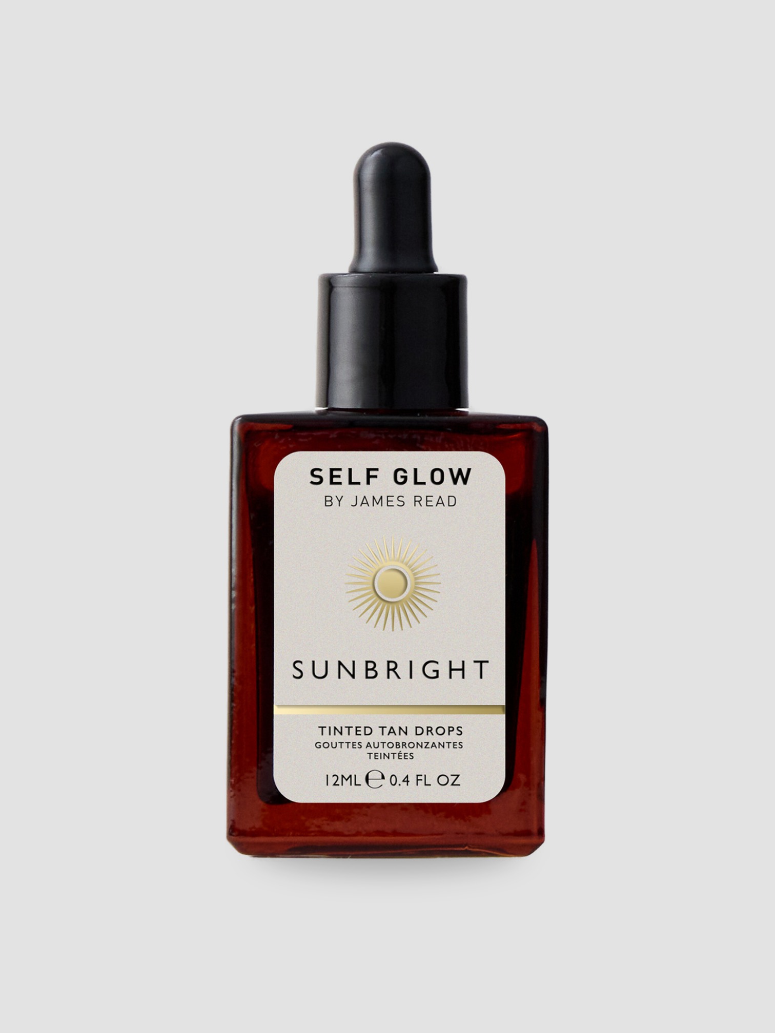 Self Glow by James Read Sunbright Tinted Tan Drops in brown.