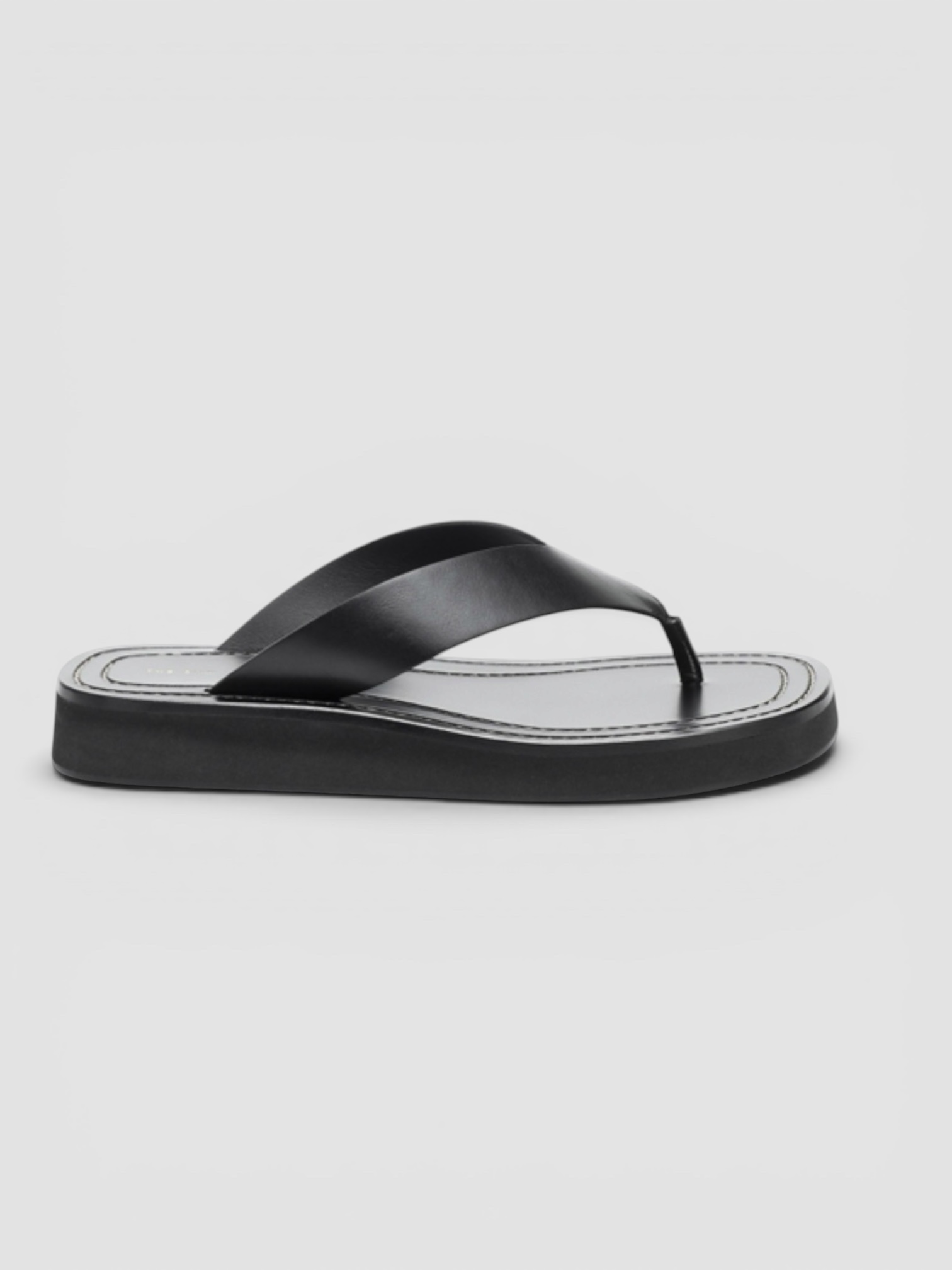 The Row Ginza Platform Sandal in black.