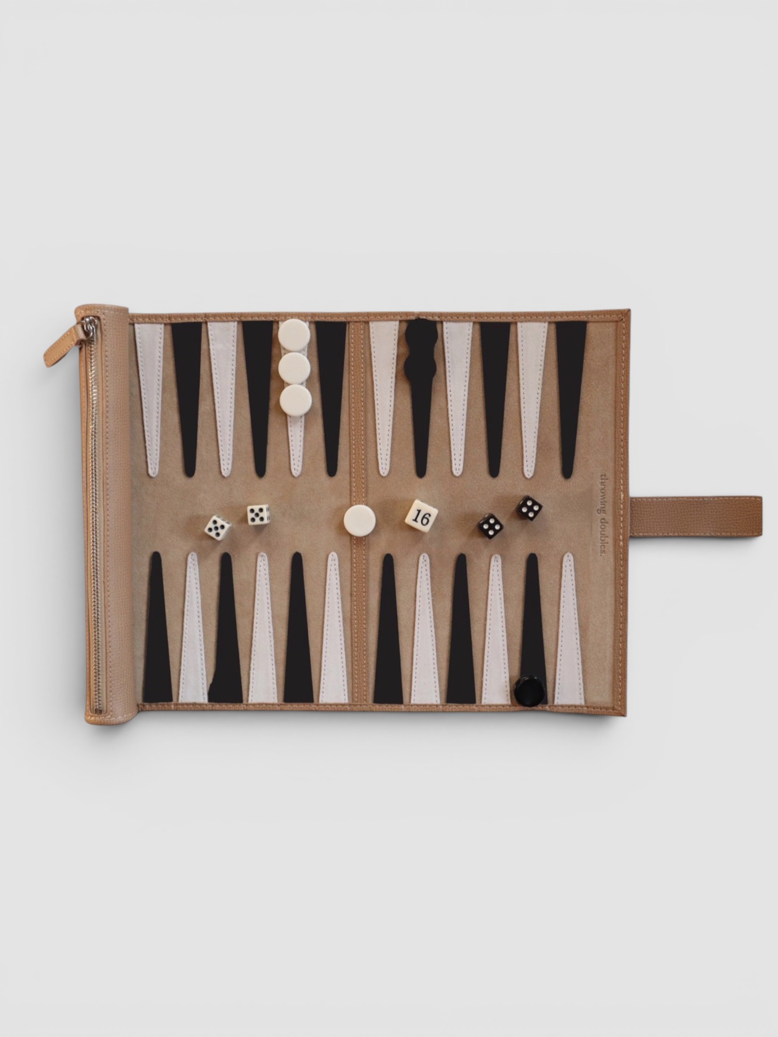 Throwing Doubles Travel Backgammon Board in tan/brown.