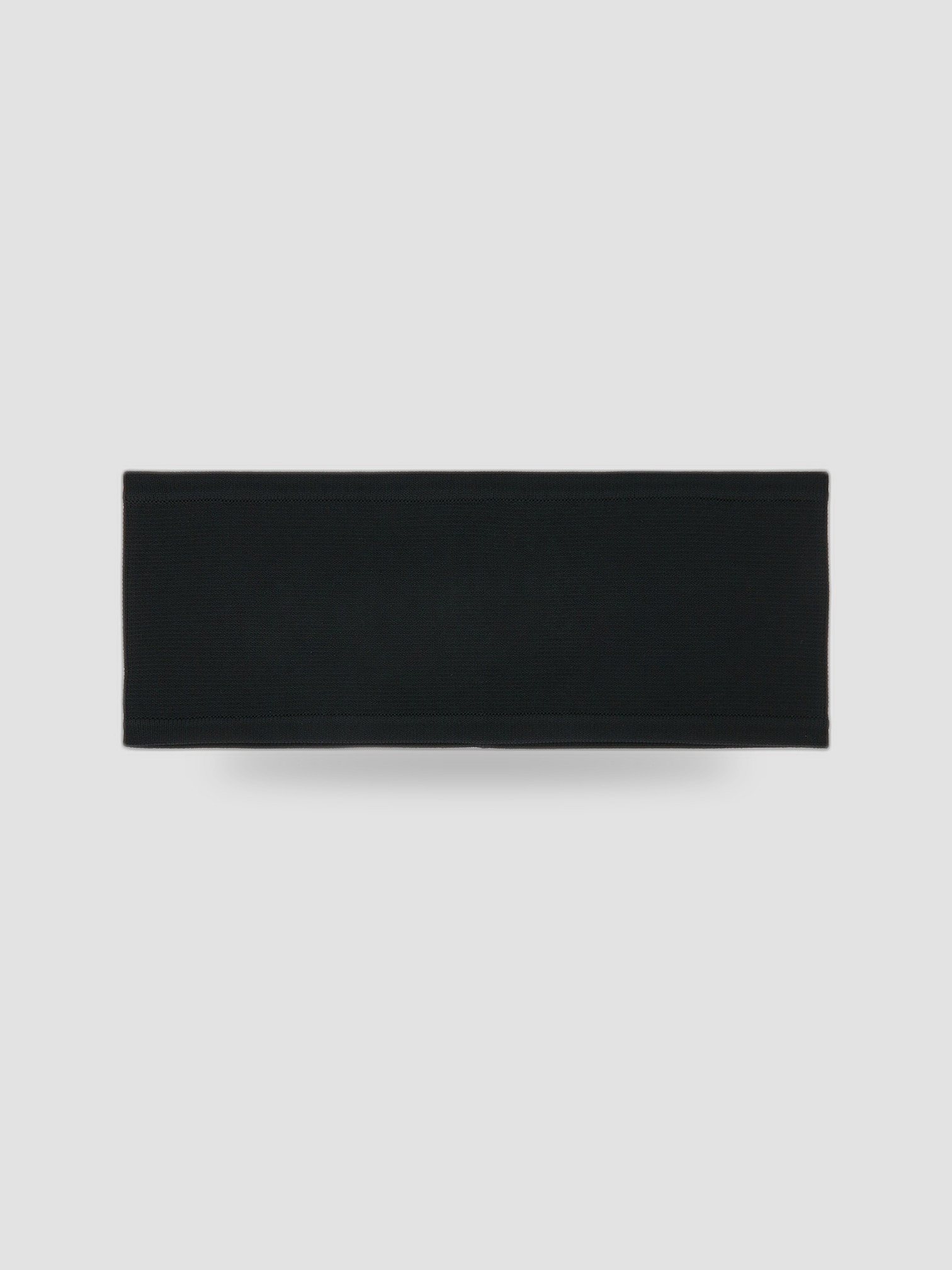Toteme Compact Knit Headband in black.