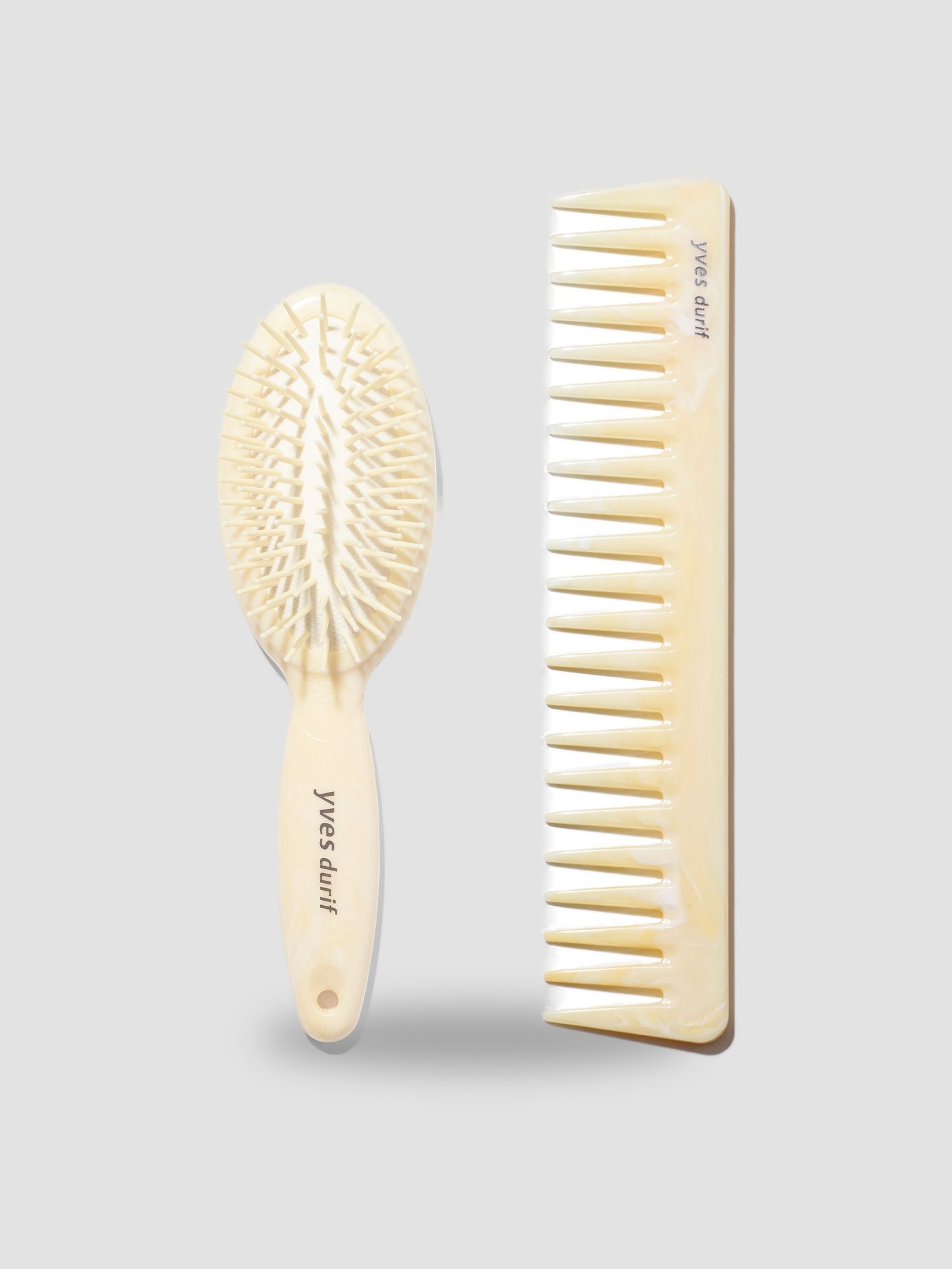 Yves Durif Comb and Petite Brush Set in ivory.